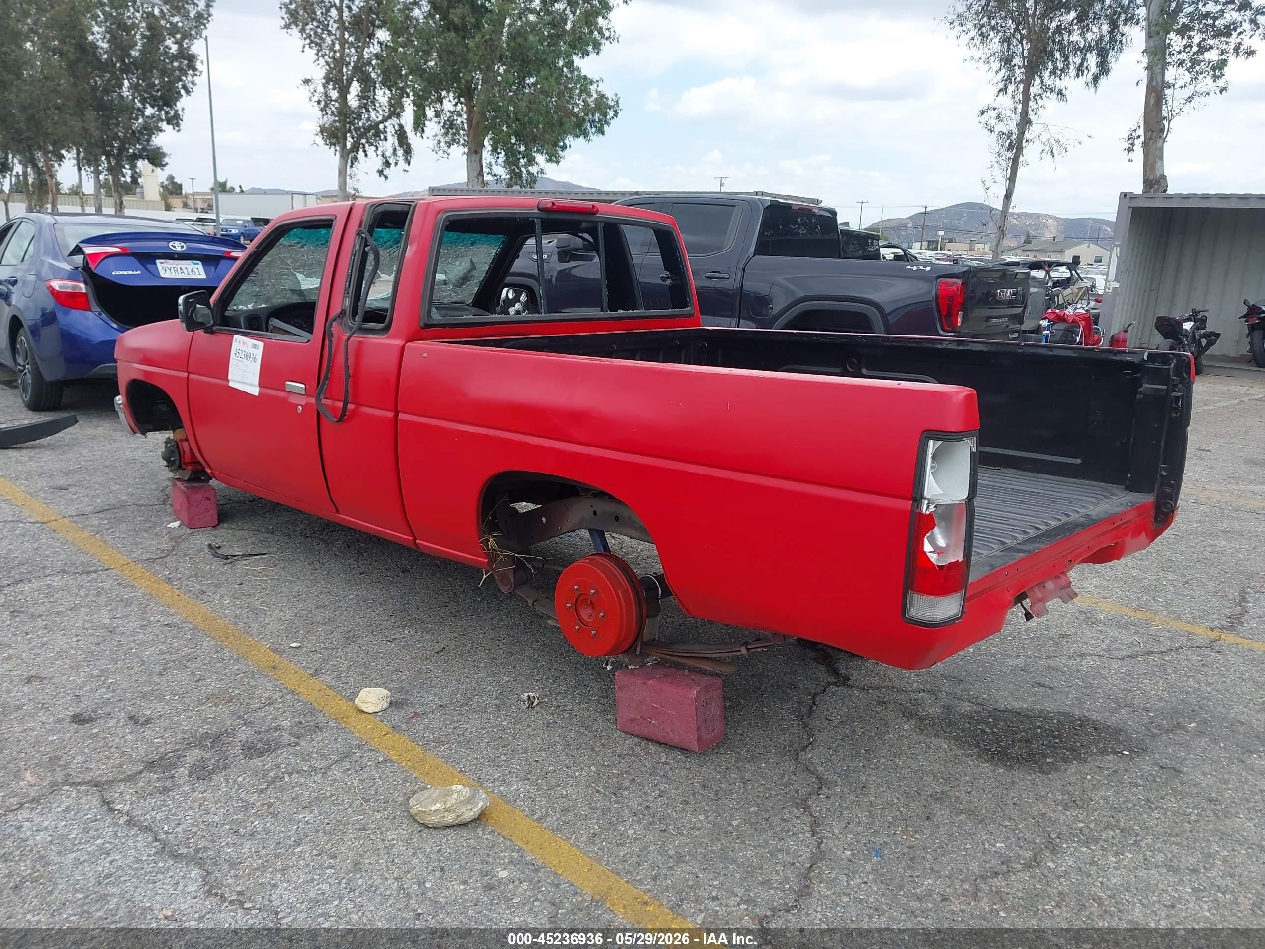 1997 Nissan 4x2 Truck   Red vin: 1N6SD16S7VC340955