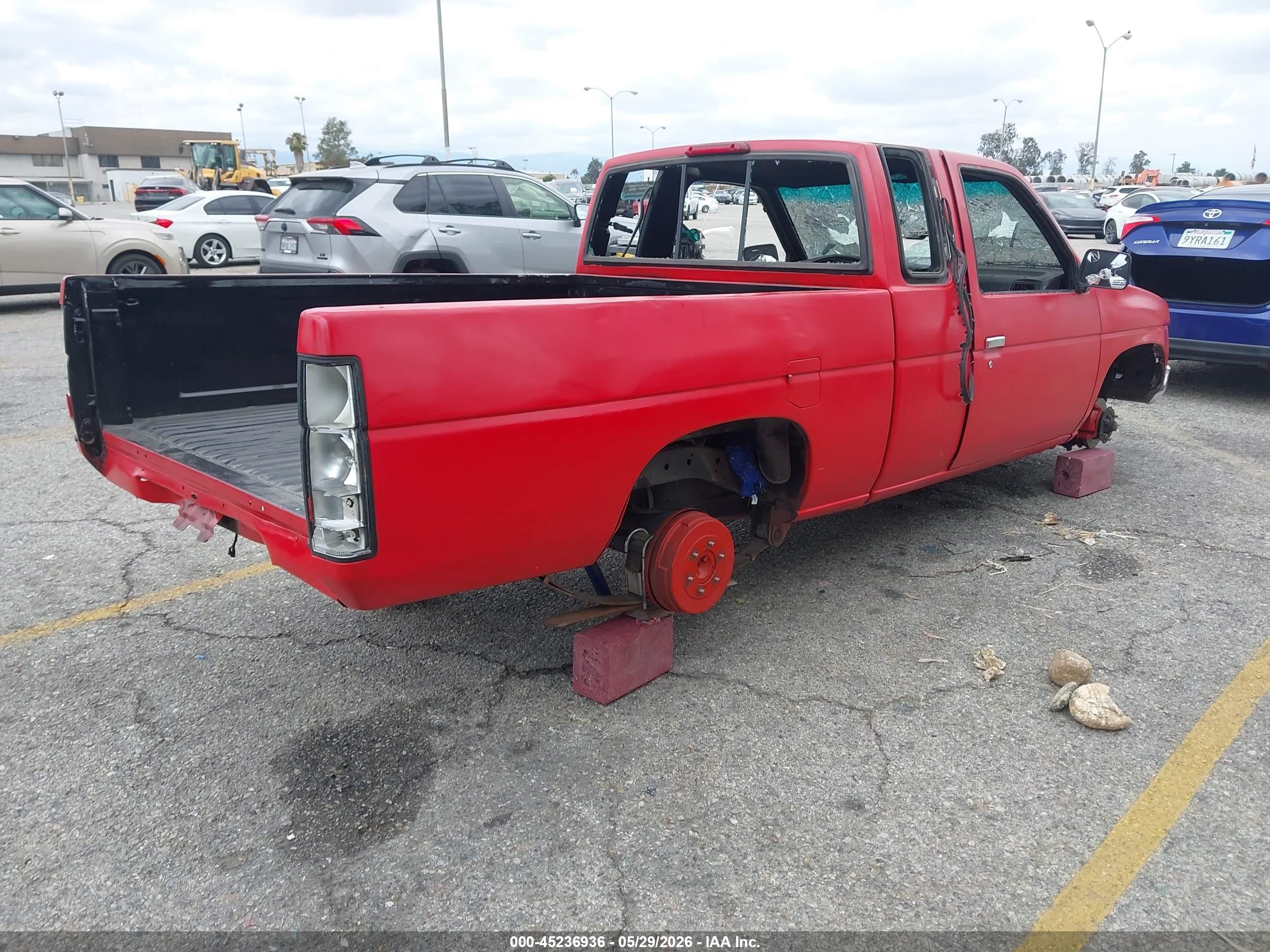 1997 Nissan 4x2 Truck   Red vin: 1N6SD16S7VC340955