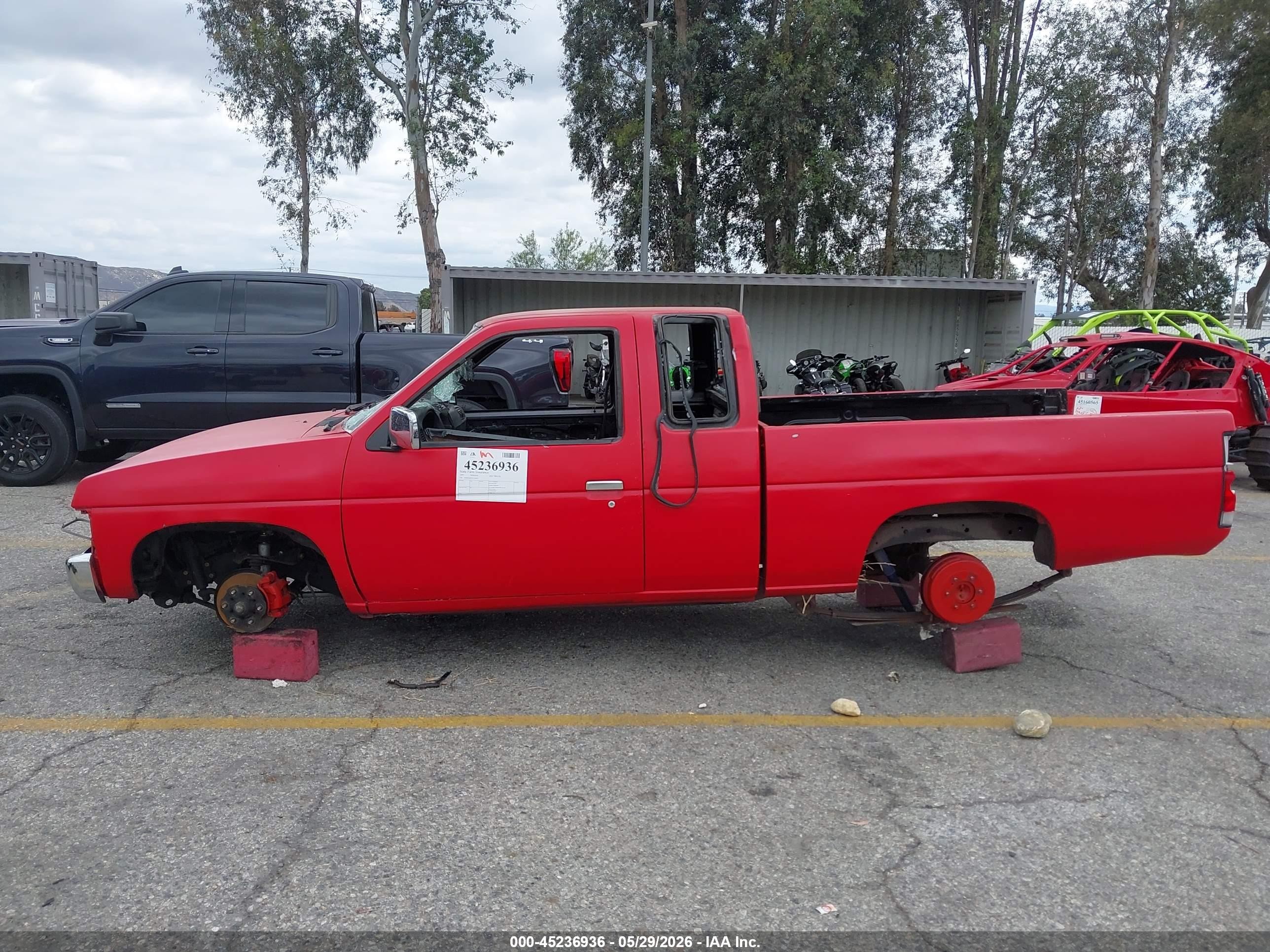 1997 Nissan 4x2 Truck   Red vin: 1N6SD16S7VC340955