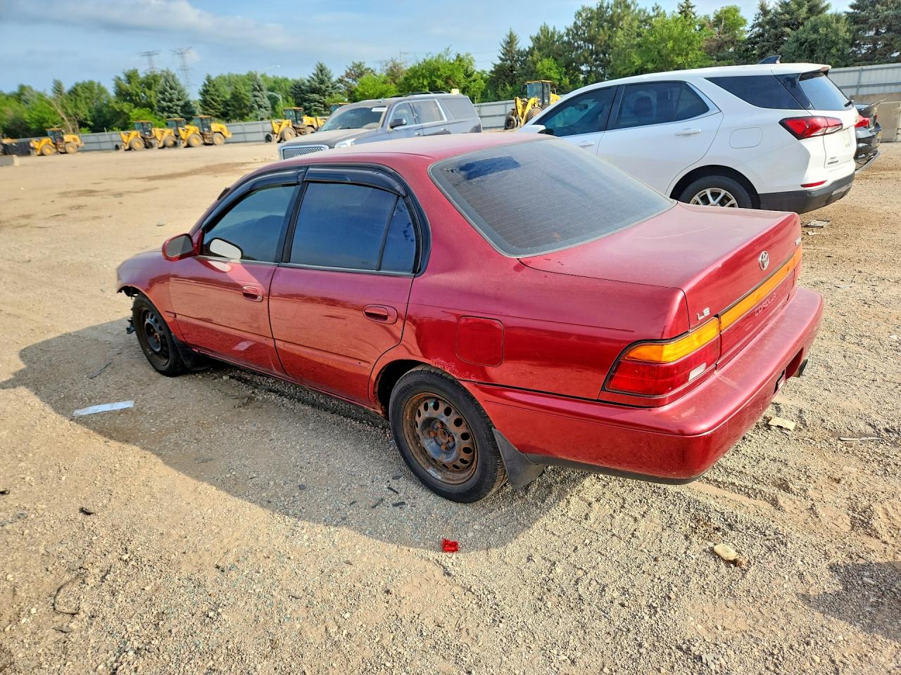 1995 Toyota Corolla Le Maroon vin: 1NXAE00B4SZ266197
