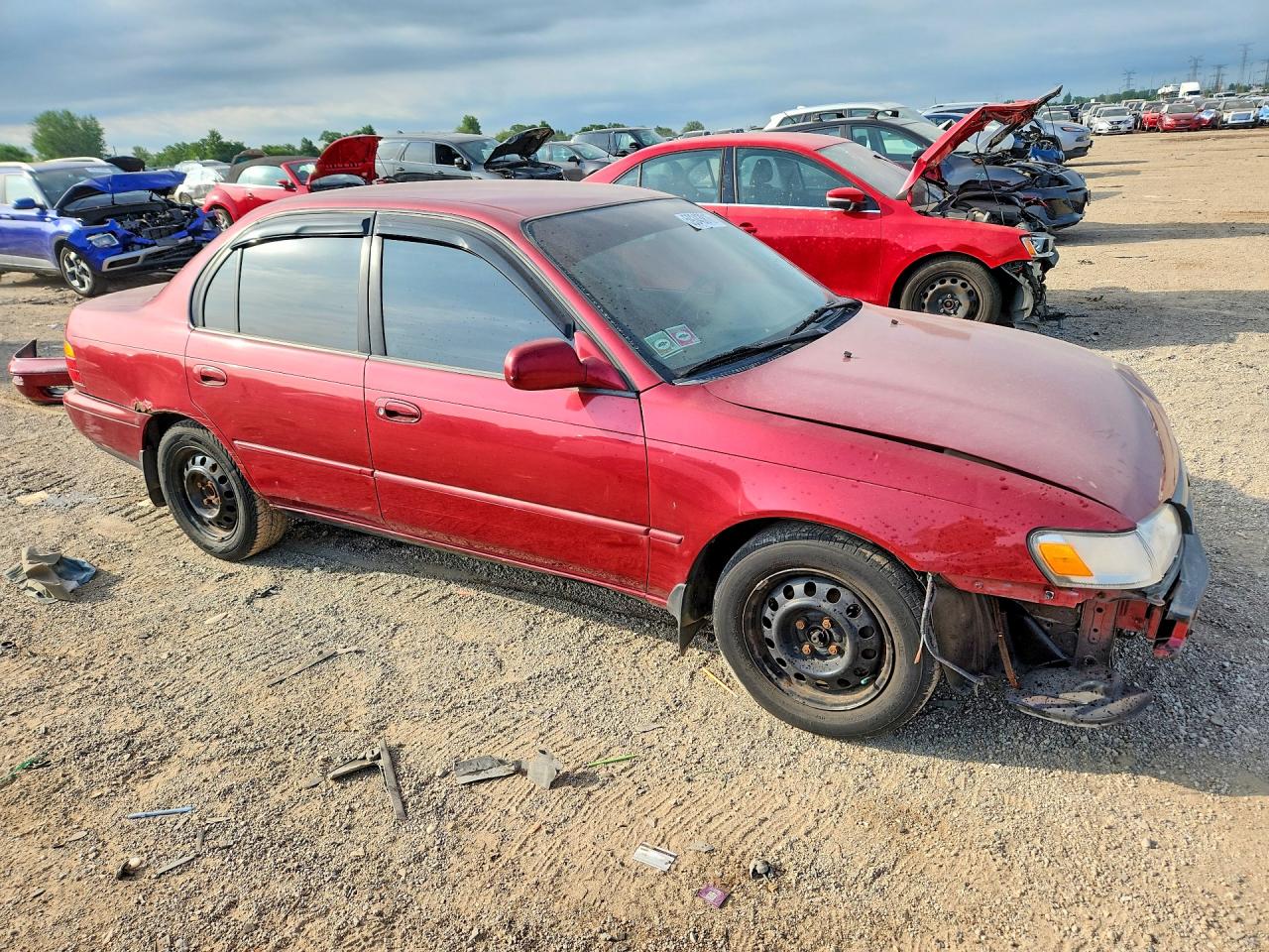 1995 Toyota Corolla Le Maroon vin: 1NXAE00B4SZ266197
