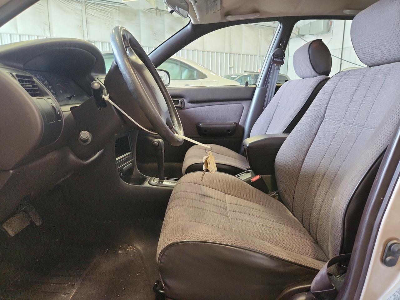 1995 Toyota Corolla Base Желто-коричневый vin: 1NXAE04B3SZ324374