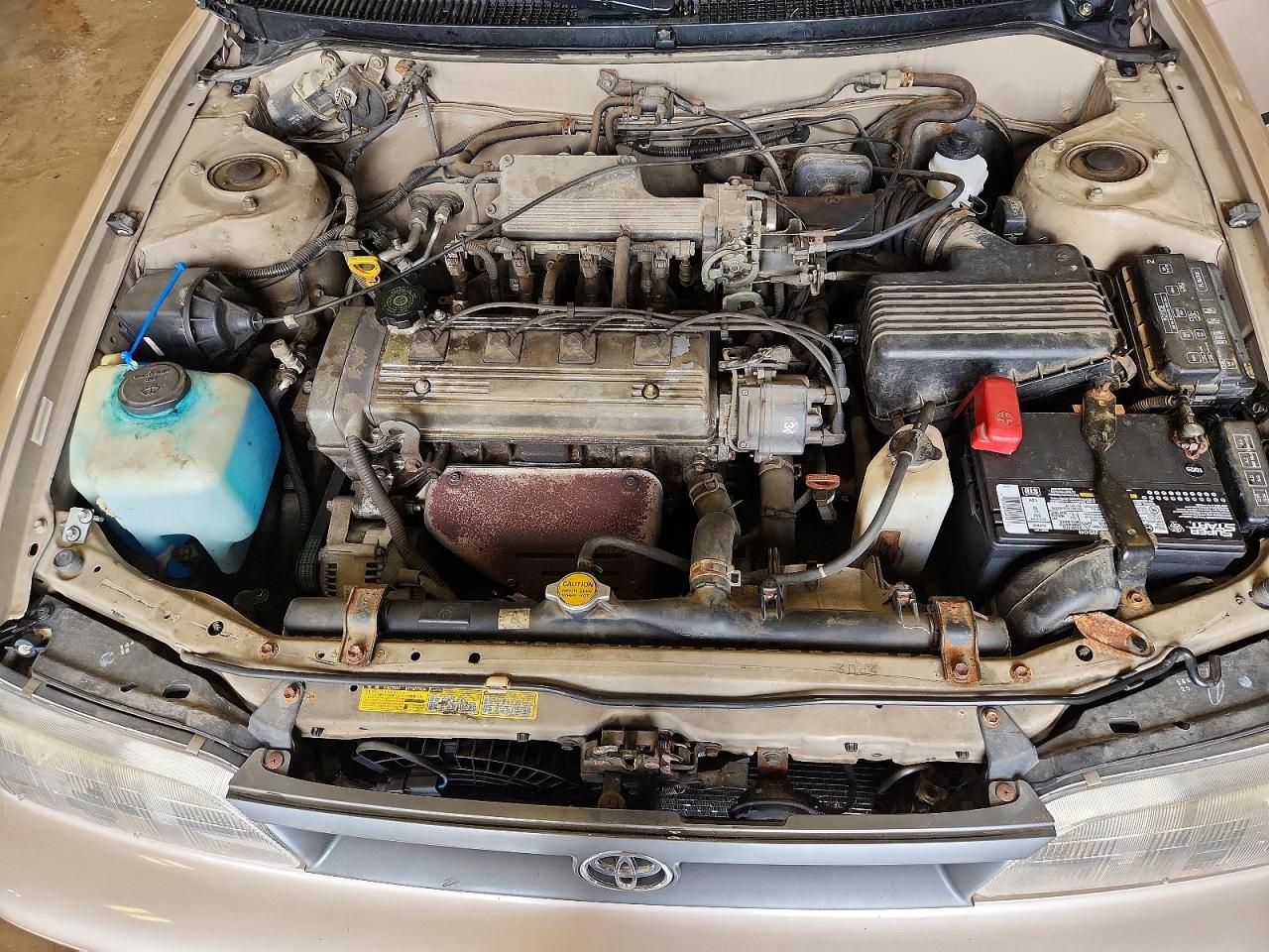 1995 Toyota Corolla Base Желто-коричневый vin: 1NXAE04B3SZ324374