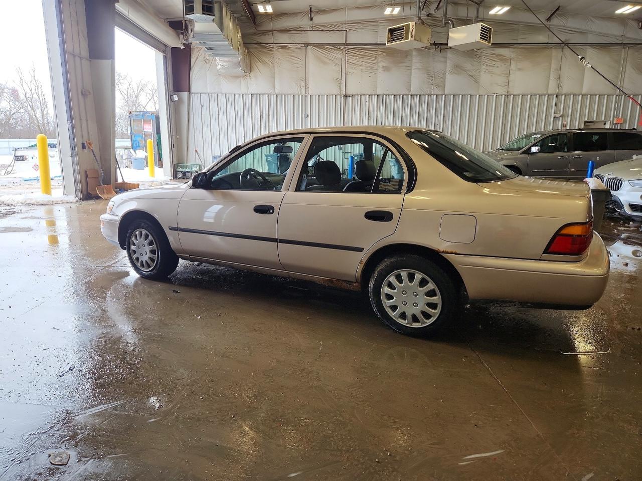 1995 Toyota Corolla Base Желто-коричневый vin: 1NXAE04B3SZ324374