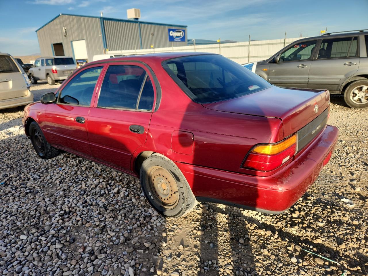 1995 Toyota Corolla Red vin: 1NXAE04BXSZ278557