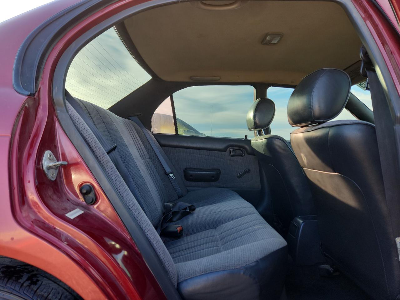 1995 Toyota Corolla Red vin: 1NXAE04BXSZ278557