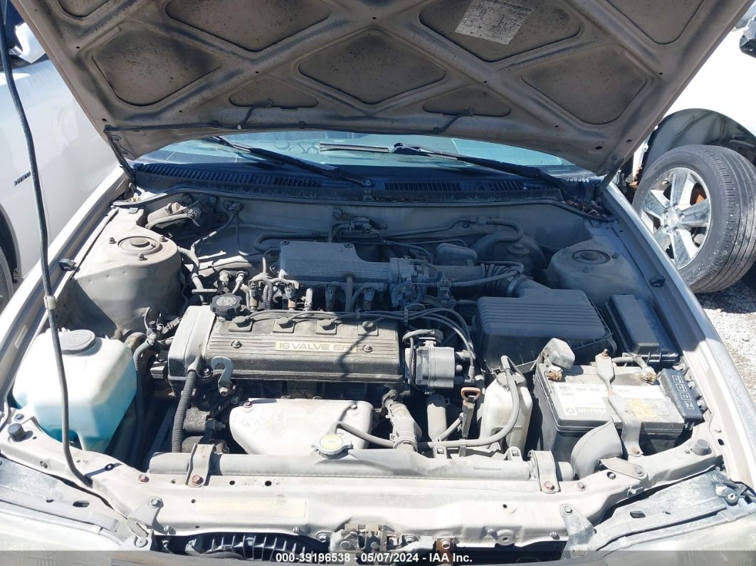 1993 Toyota Corolla Le/dx Золотой vin: 1NXAE09E2PZ068805