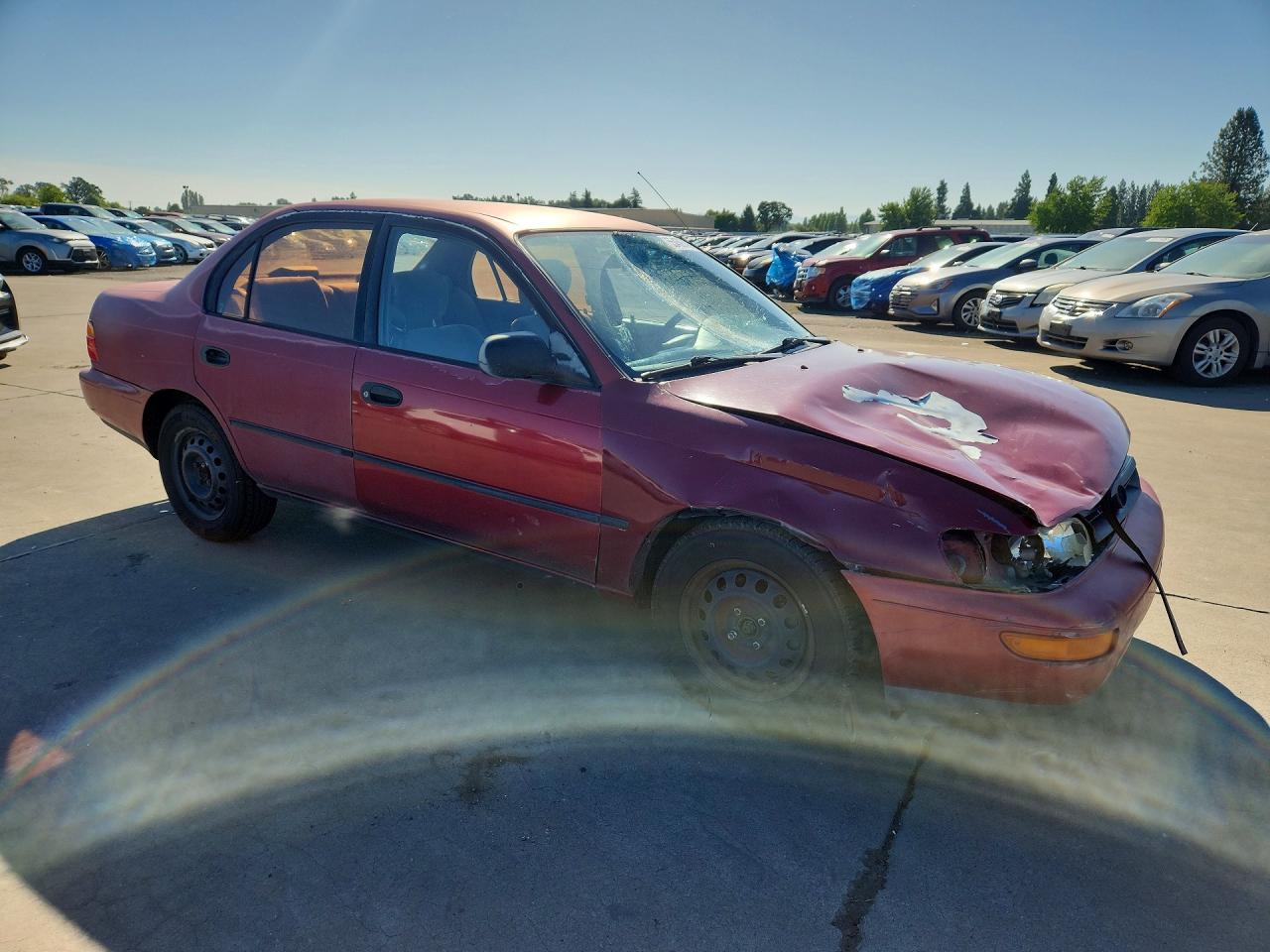 1993 Toyota Corolla Deluxe Red vin: 1NXAE09EXPZ104305