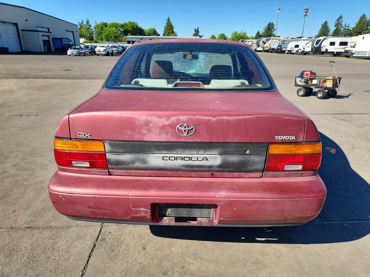 1993 Toyota Corolla Deluxe Red vin: 1NXAE09EXPZ104305