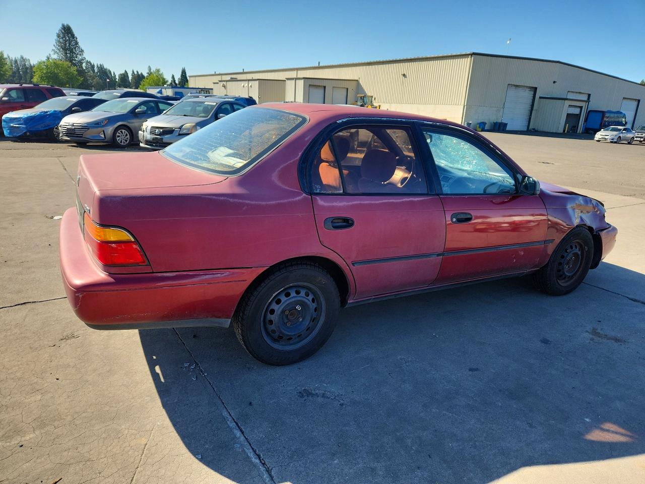 1993 Toyota Corolla Deluxe Red vin: 1NXAE09EXPZ104305