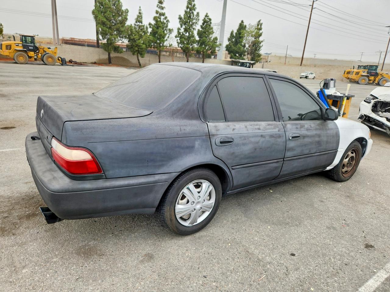 1997 Toyota Corolla Base Two Tone vin: 1NXBA02E1VZ561978