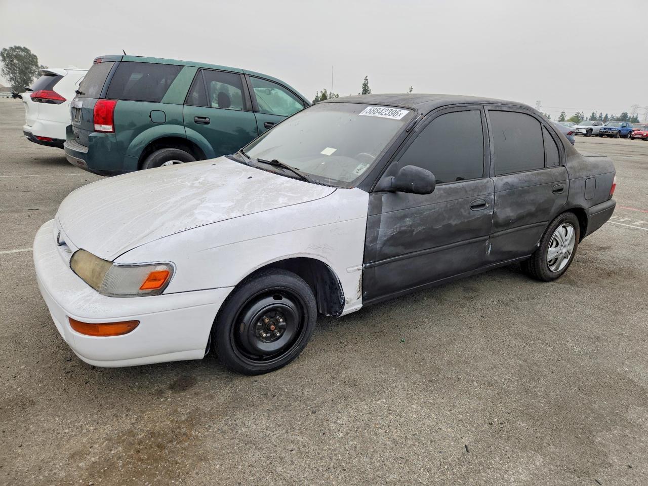 1997 Toyota Corolla Base Two Tone vin: 1NXBA02E1VZ561978