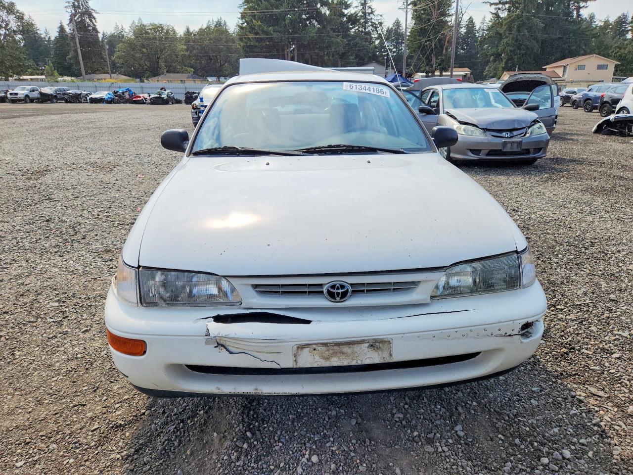 1997 Toyota Corolla Base White vin: 1NXBA02E3VZ534927