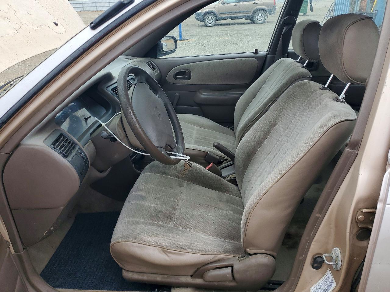 1997 Toyota Corolla Base Beige vin: 1NXBA02E4VZ647477