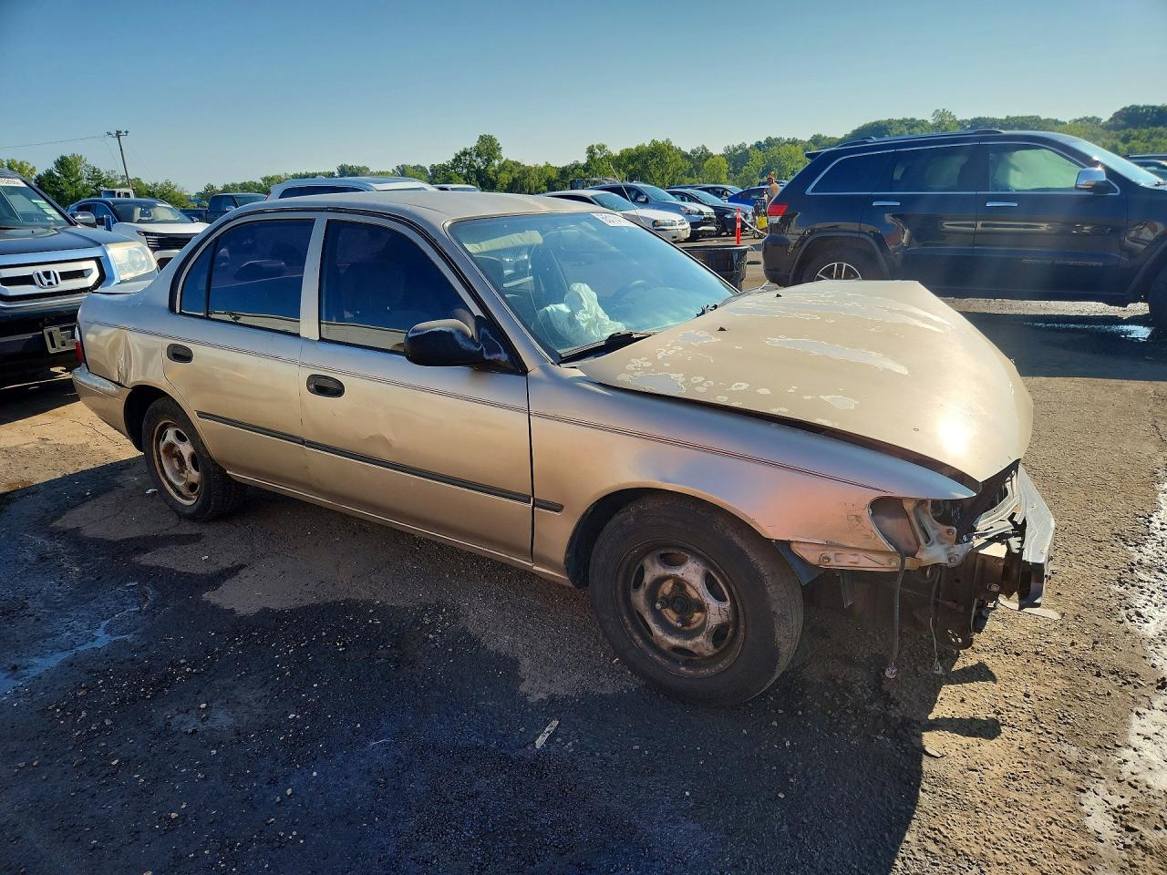 1997 Toyota Corolla Base Желто-коричневый vin: 1NXBA02E7VZ558258