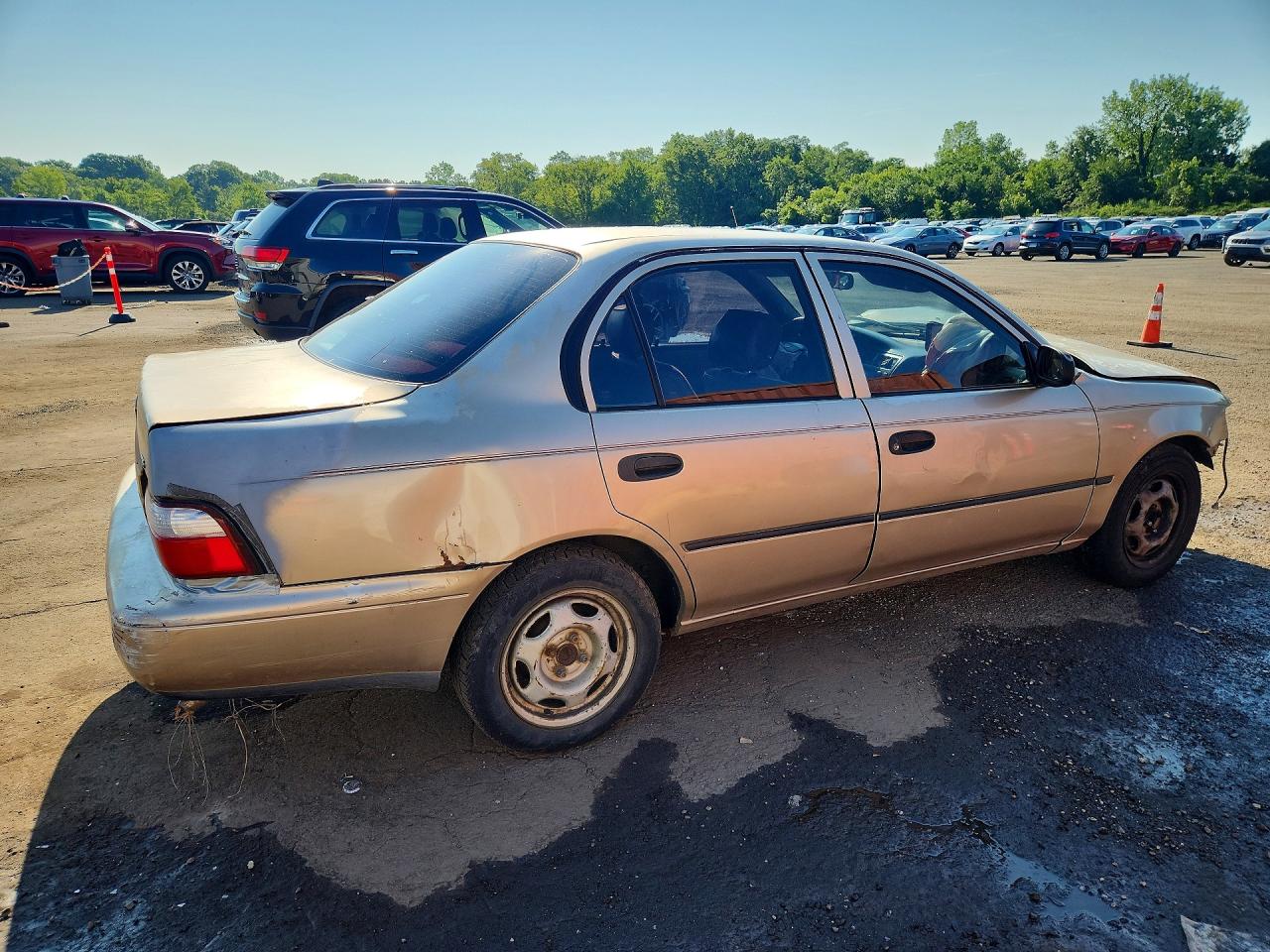 1997 Toyota Corolla Base Желто-коричневый vin: 1NXBA02E7VZ558258