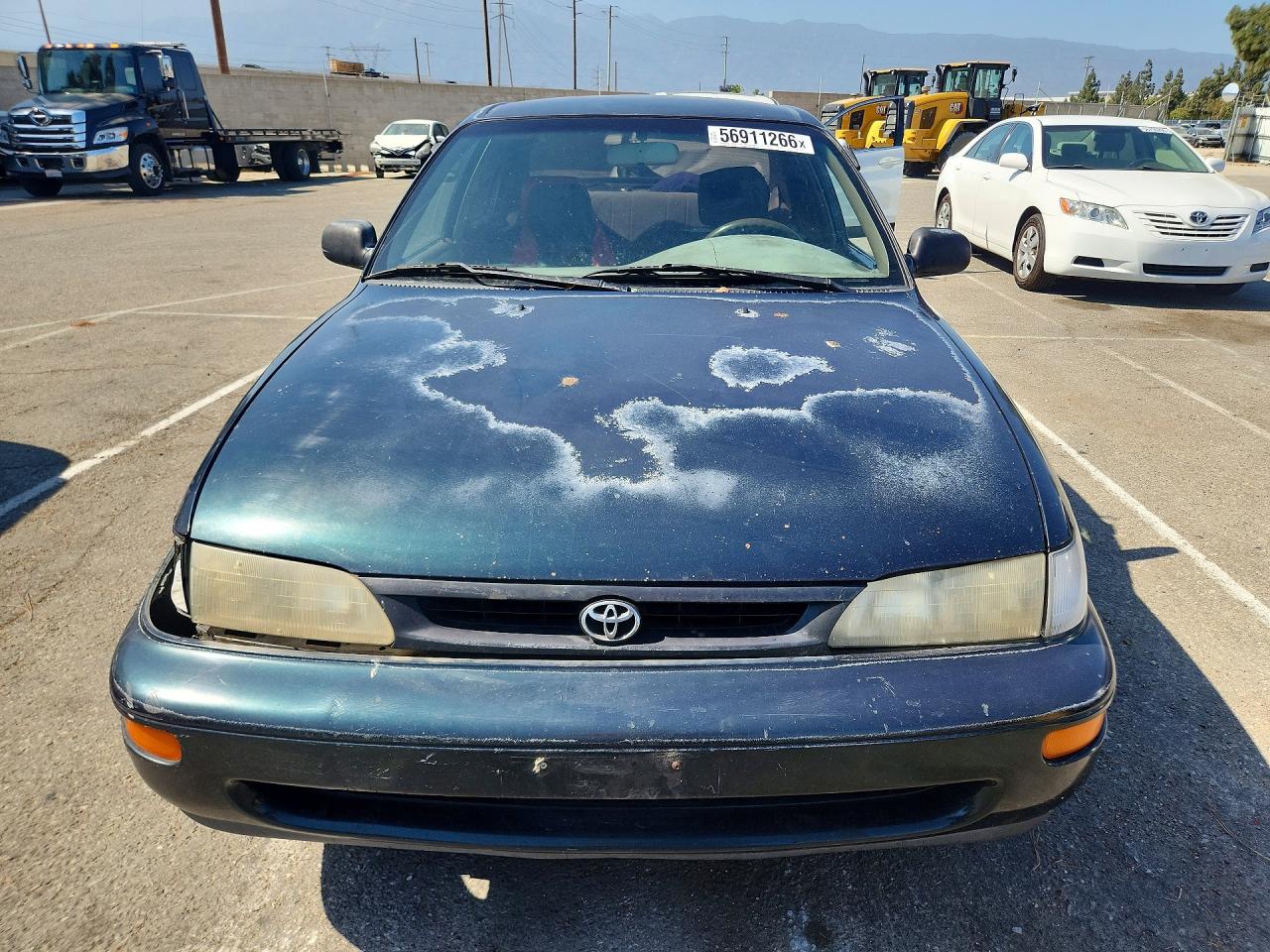1997 Toyota Corolla Base Зеленый vin: 1NXBA02E8VZ621027