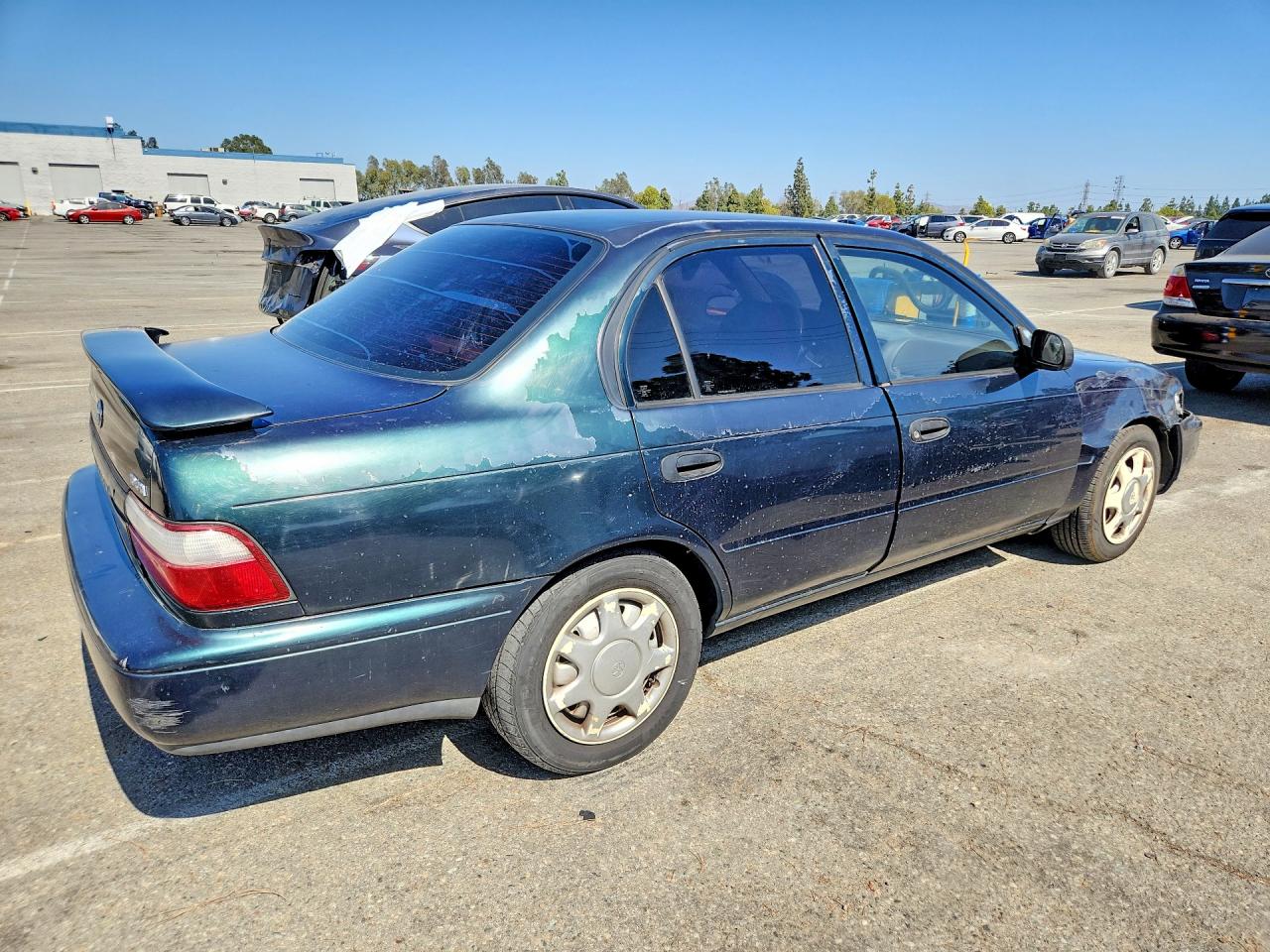 1997 Toyota Corolla Base Зеленый vin: 1NXBA02E8VZ621027