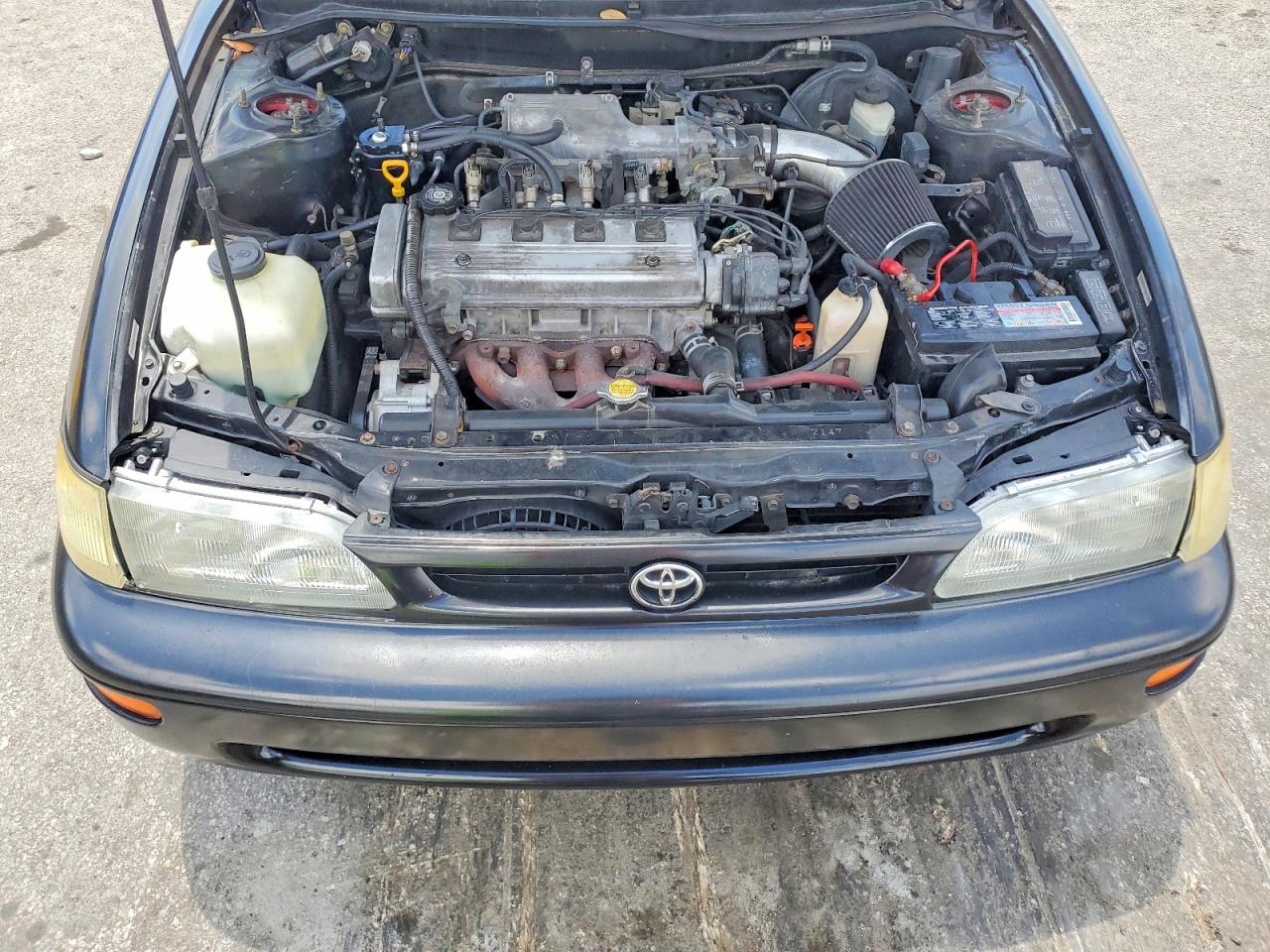 1997 Toyota Corolla Base Black vin: 1NXBA02E9VZ614121