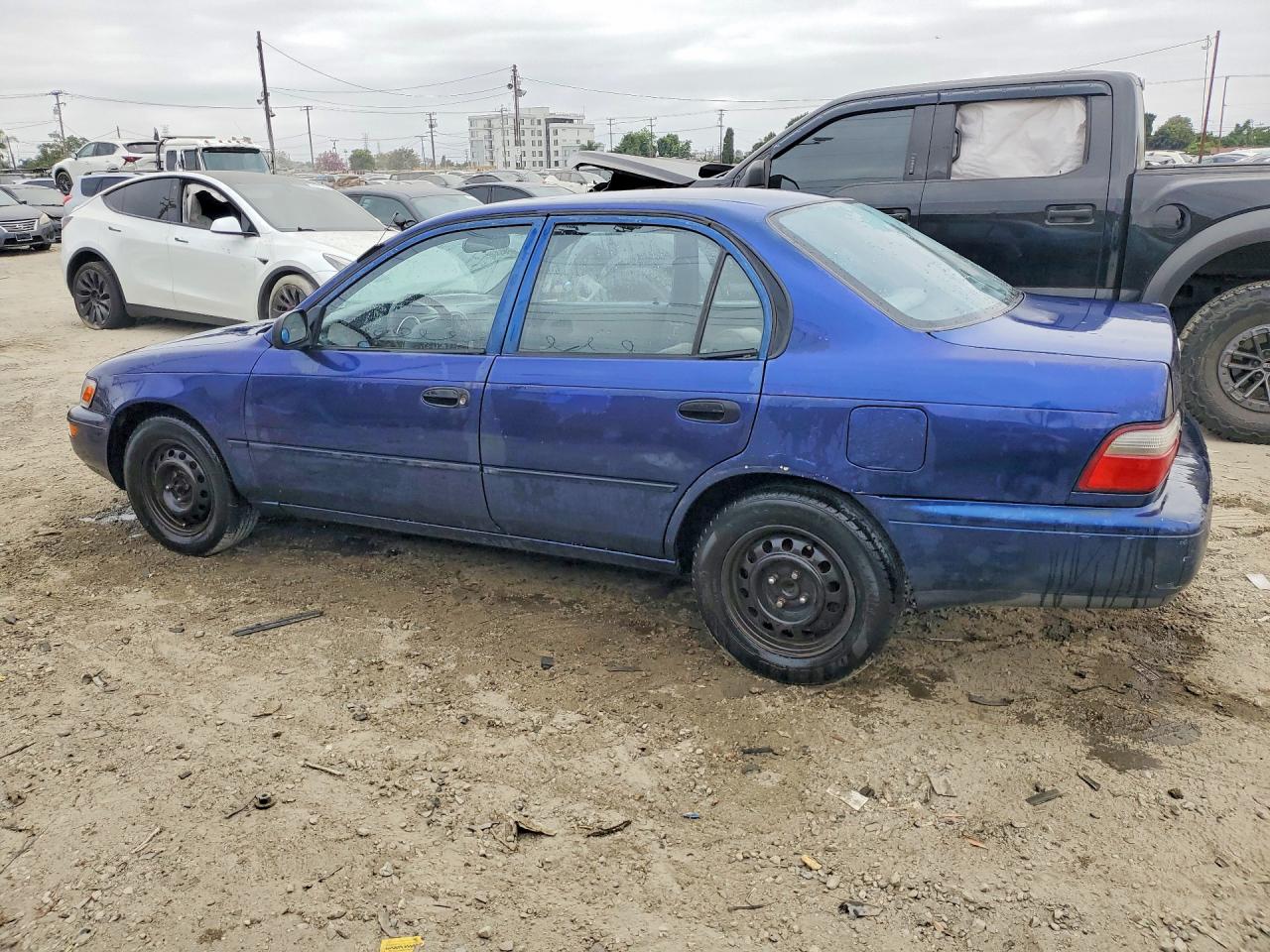 1997 Toyota Corolla Base Blue vin: 1NXBA02EXVZ558772