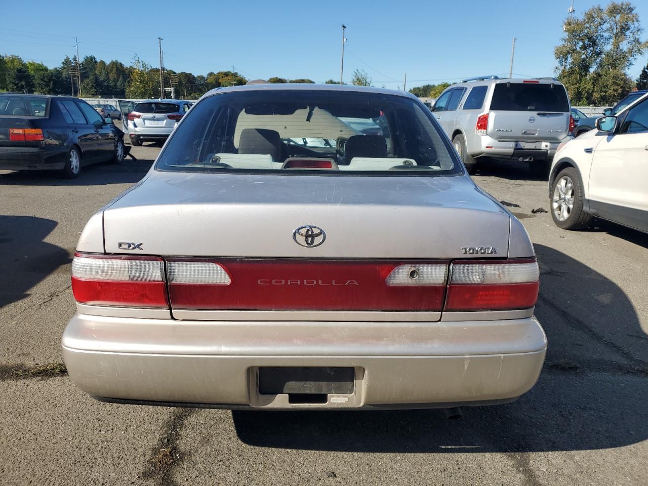 1997 Toyota Corolla Dx Tan vin: 1NXBB02E7VZ636731
