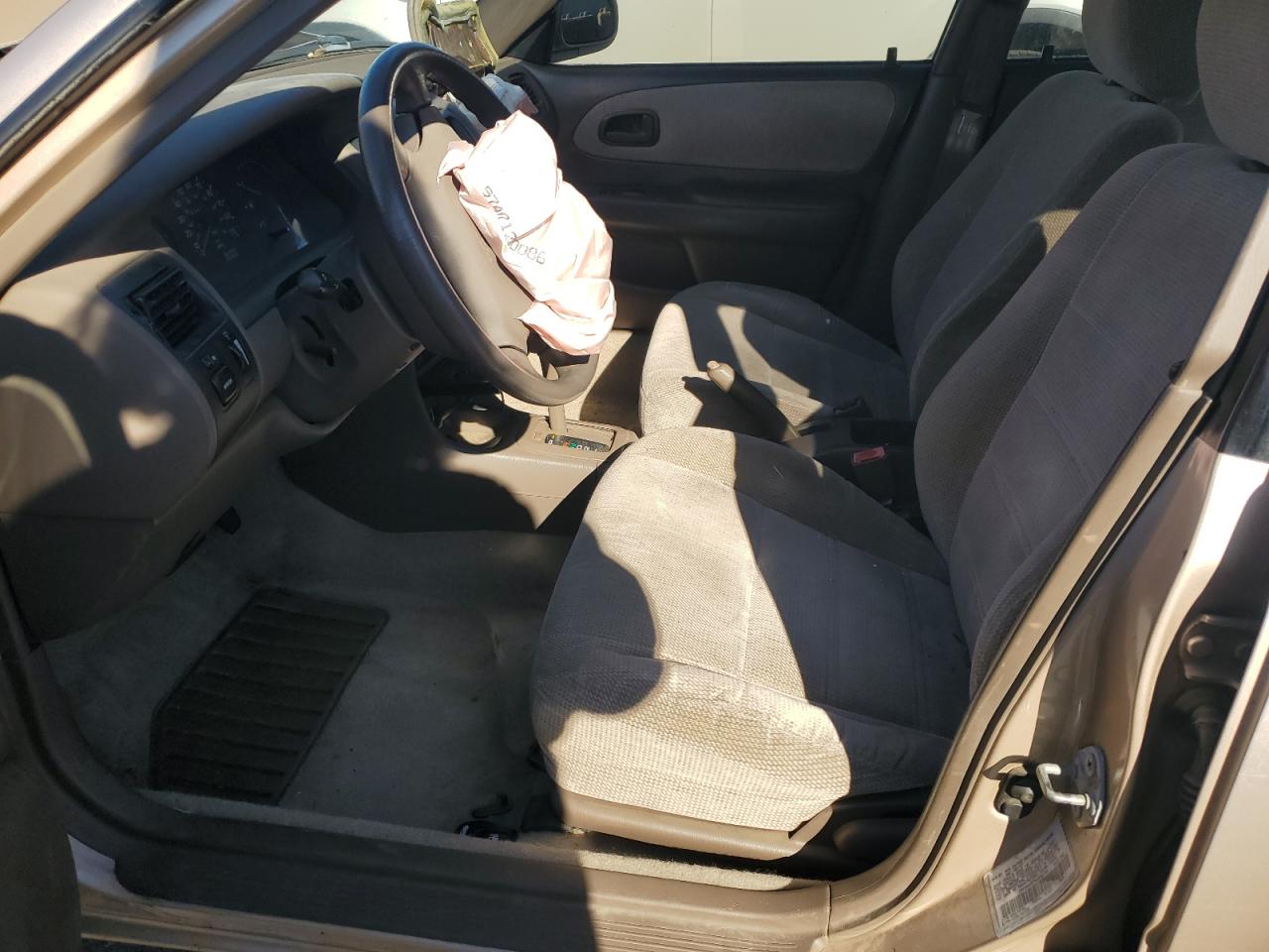 1997 Toyota Corolla Dx Tan vin: 1NXBB02E7VZ636731