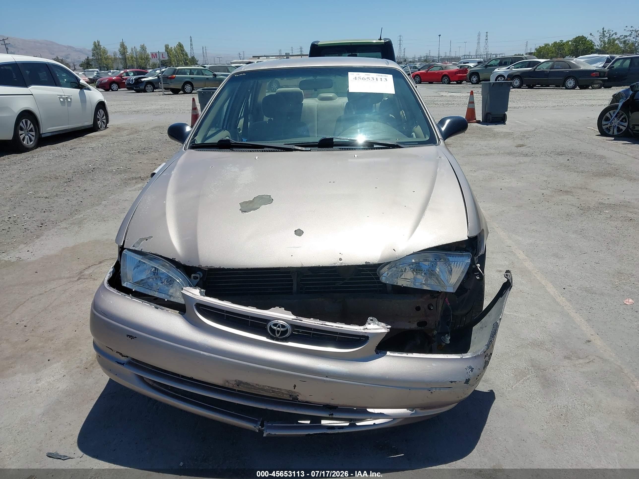 1999 Toyota Corolla Ce Gold vin: 1NXBR12E1XZ159282