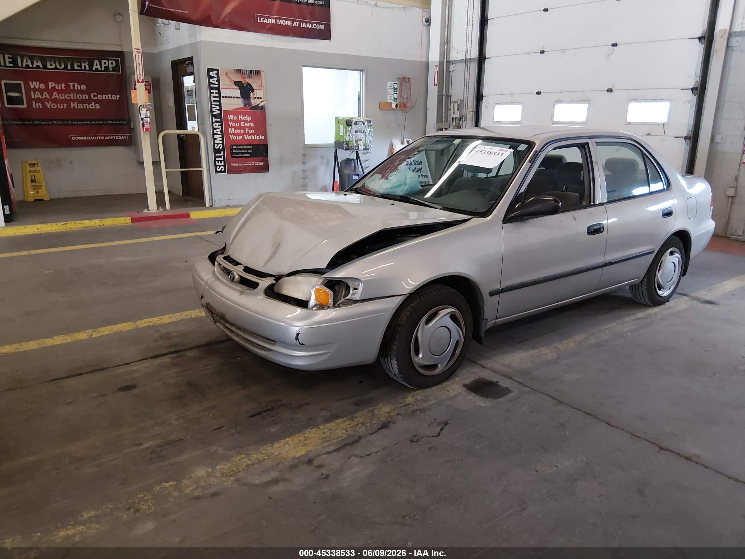 1999 Toyota Corolla Ce Silver vin: 1NXBR12E2XZ147173