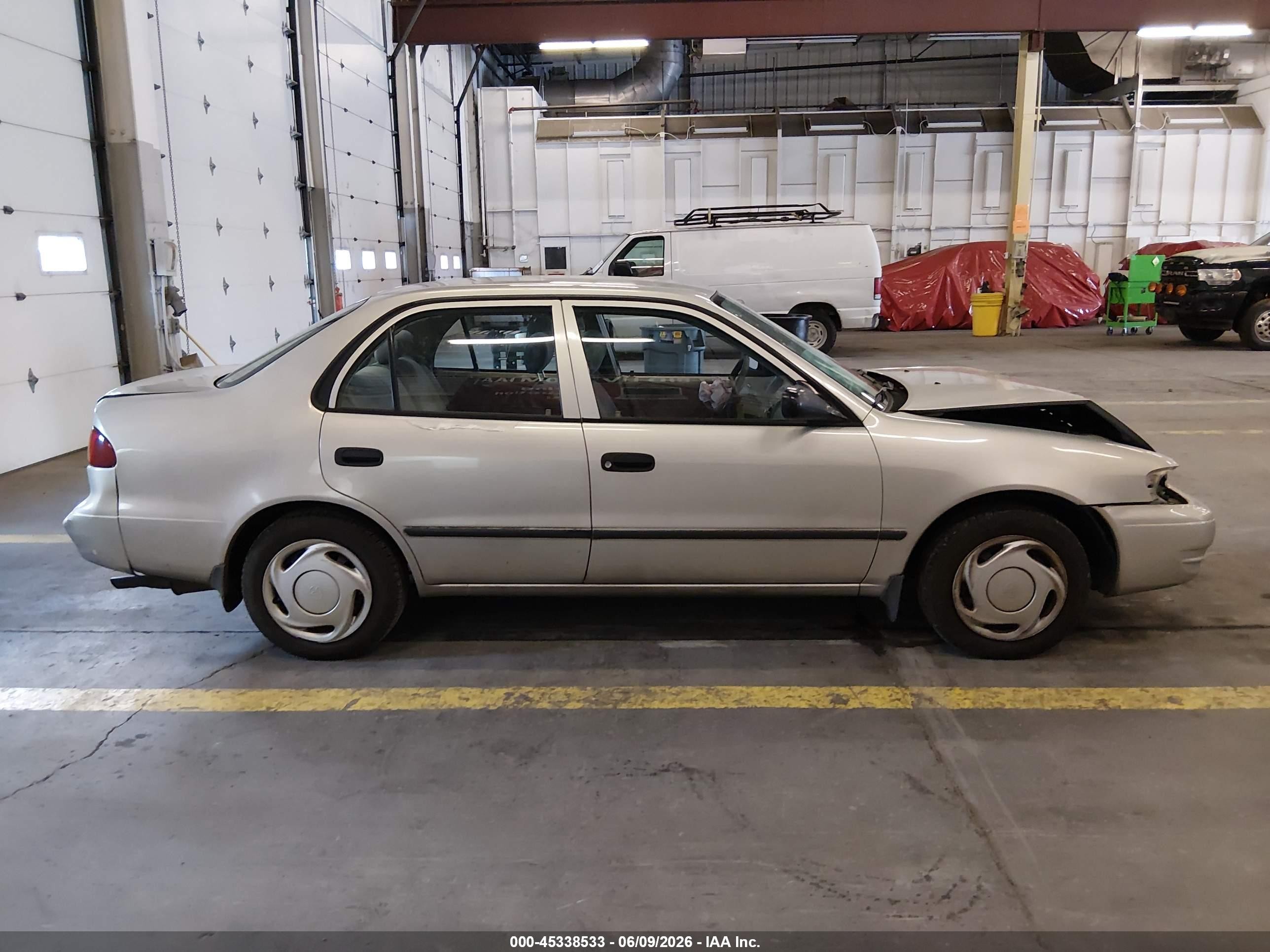 1999 Toyota Corolla Ce Silver vin: 1NXBR12E2XZ147173