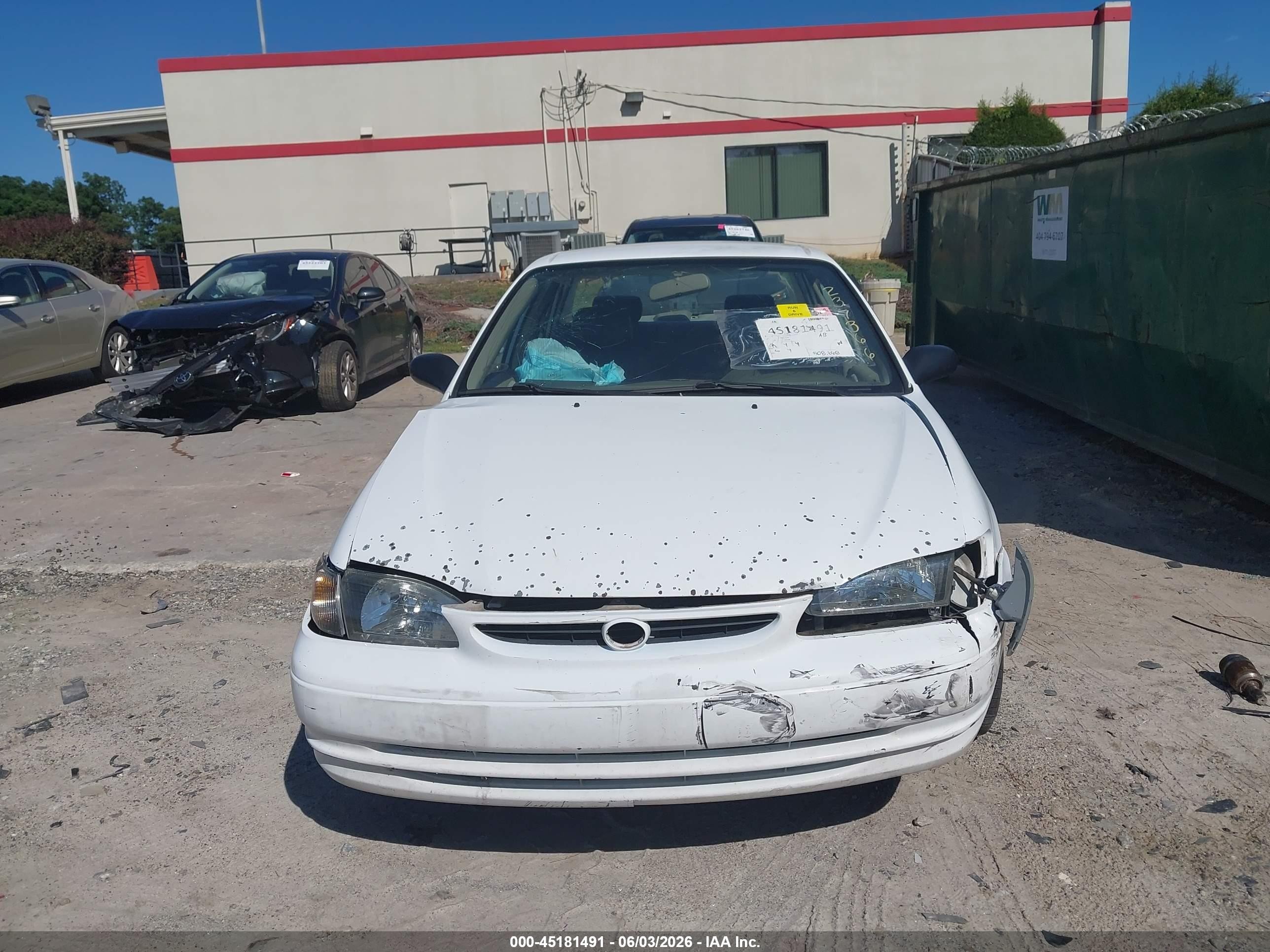 1999 Toyota Corolla Ce White vin: 1NXBR12E3XZ237366