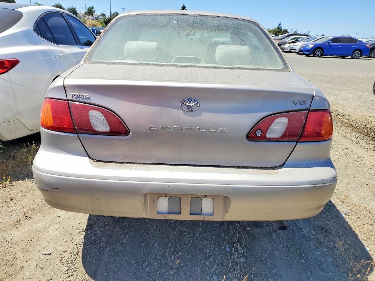 1998 Toyota Corolla Ve Tan vin: 1NXBR12E6WZ074100