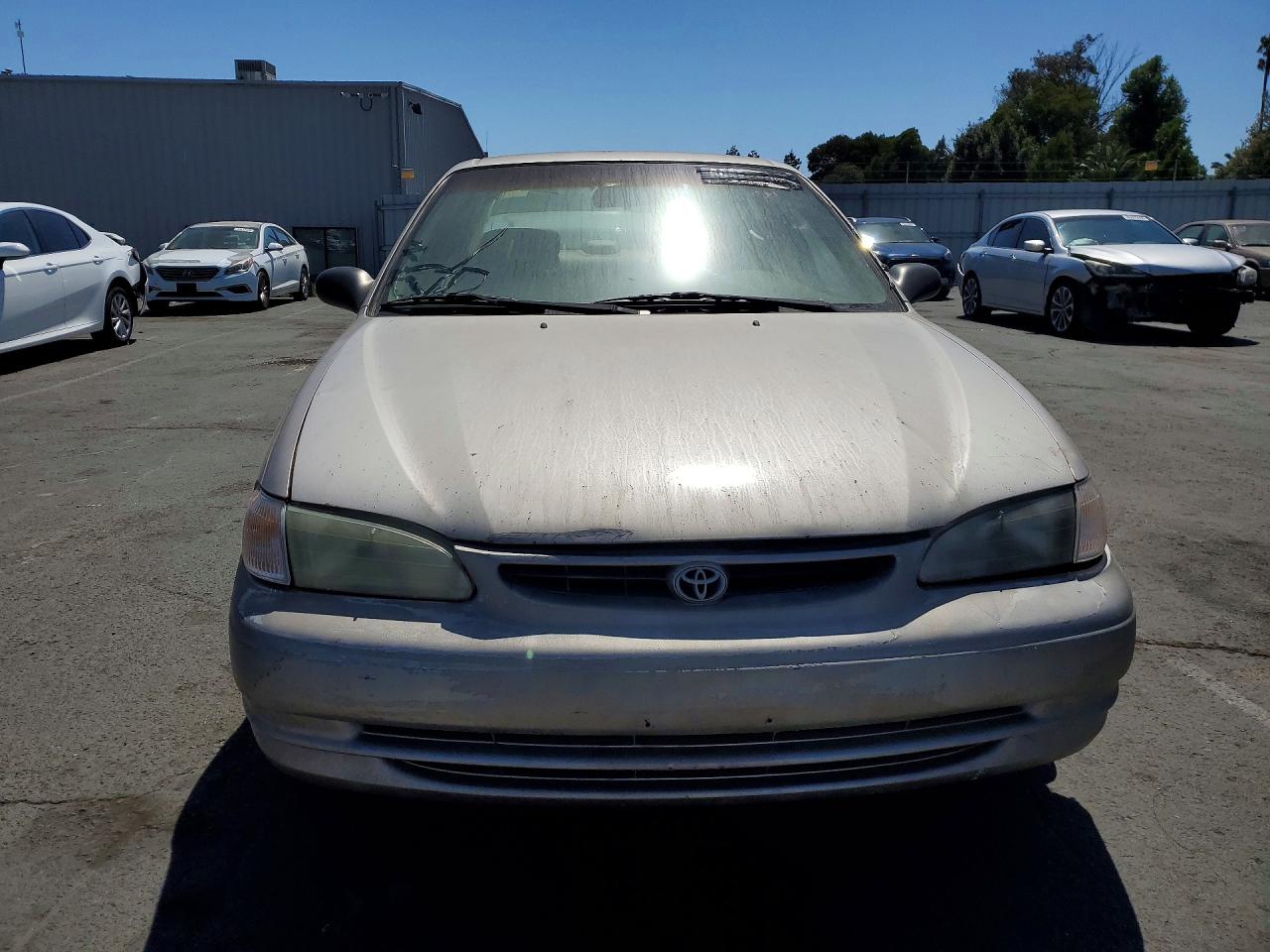 1998 Toyota Corolla Ve Tan vin: 1NXBR12E6WZ074100