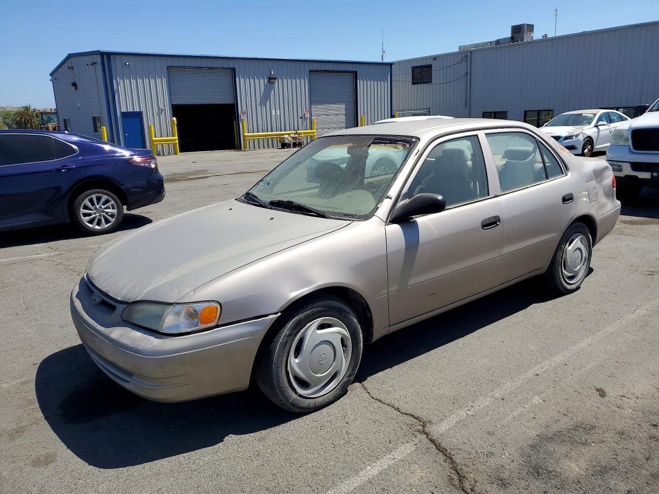 1998 Toyota Corolla Ve Tan vin: 1NXBR12E6WZ074100