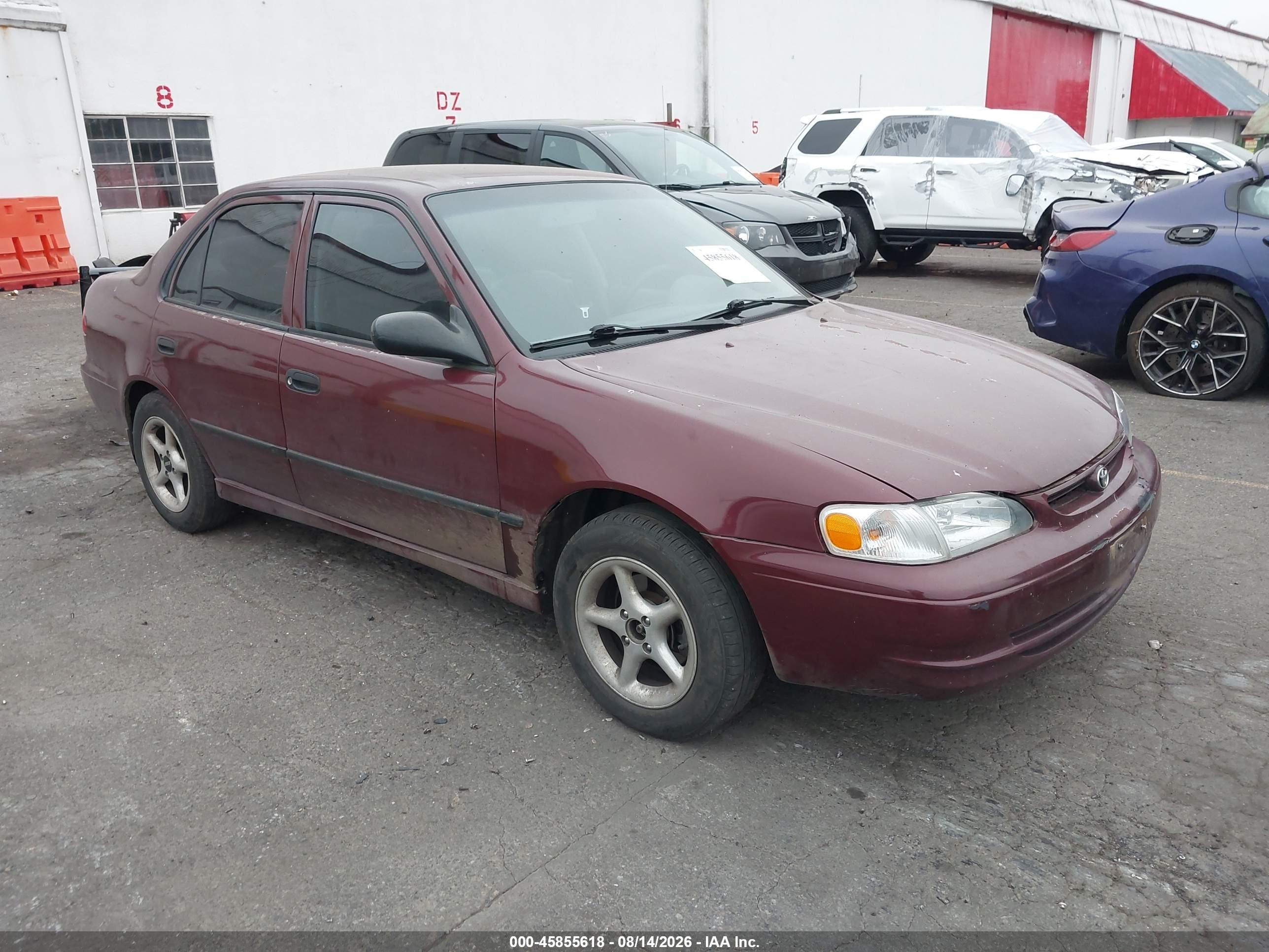1998 Toyota Corolla Ce Burgundy vin: 1NXBR12E7WZ080990
