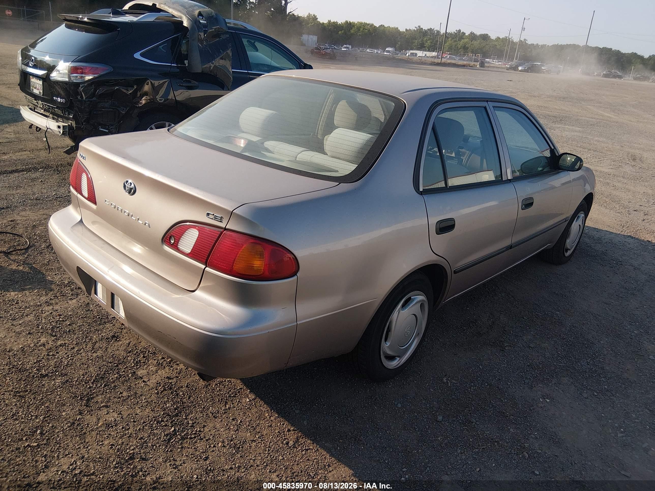 1999 Toyota Corolla Ce Tan vin: 1NXBR12E9XZ159322