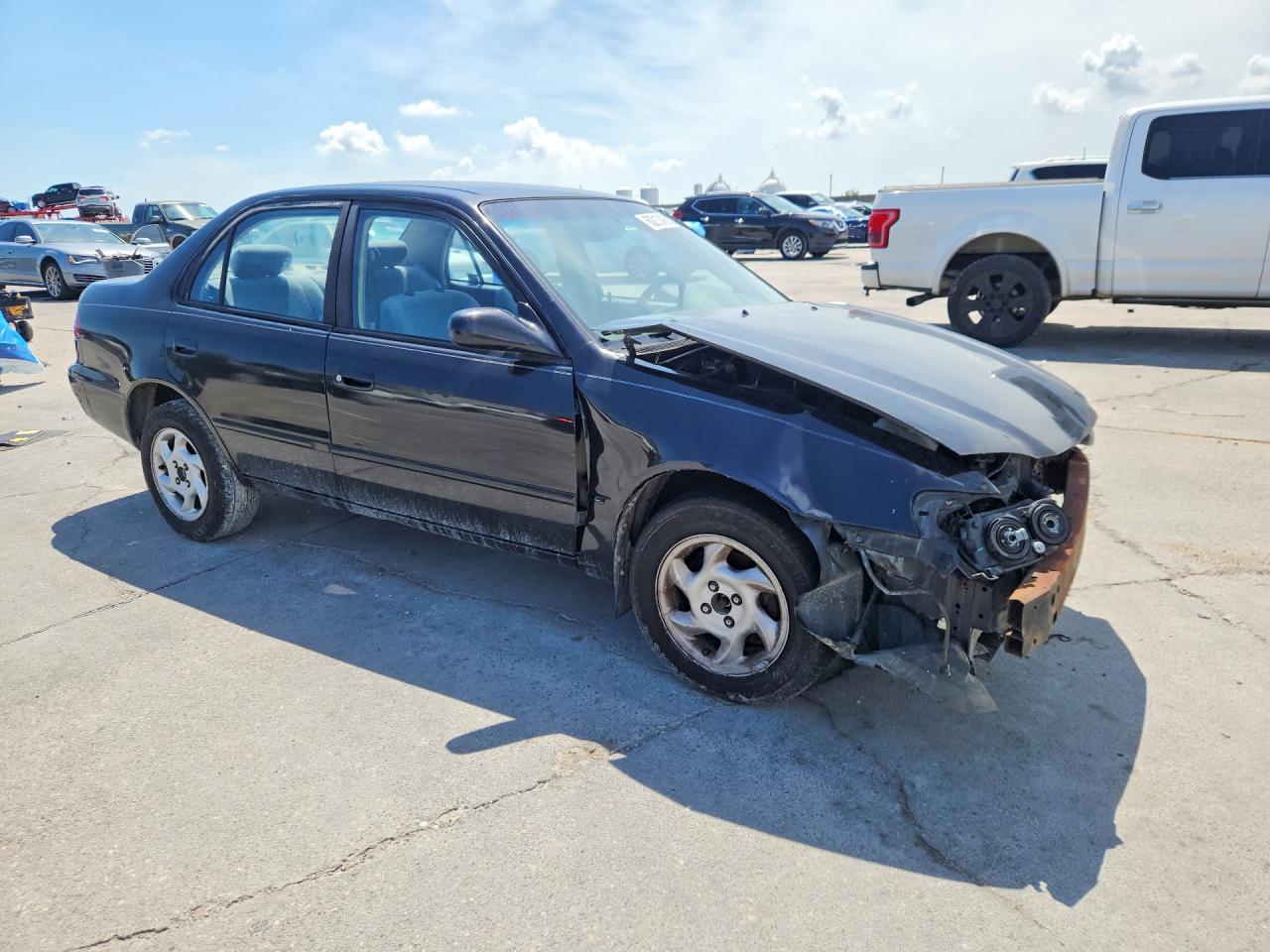 2001 Toyota Corolla Le Black vin: 1NXBR12EX1Z437216