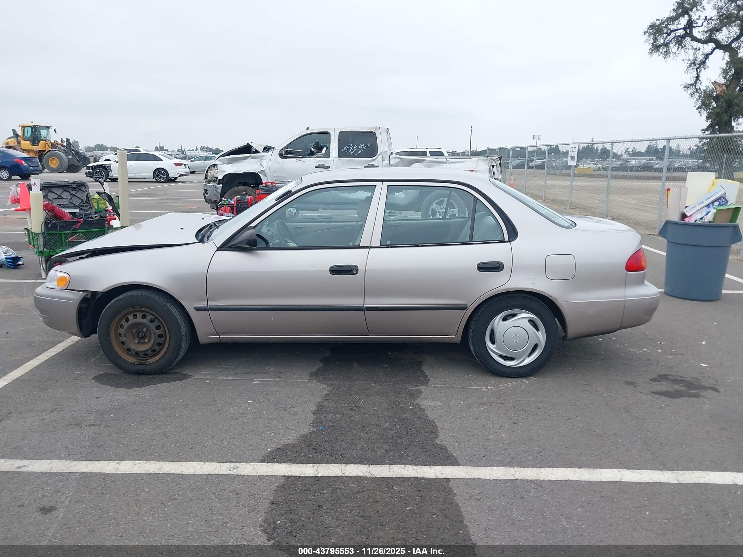 2000 Toyota Corolla Ce Tan vin: 1NXBR12EXYZ340432