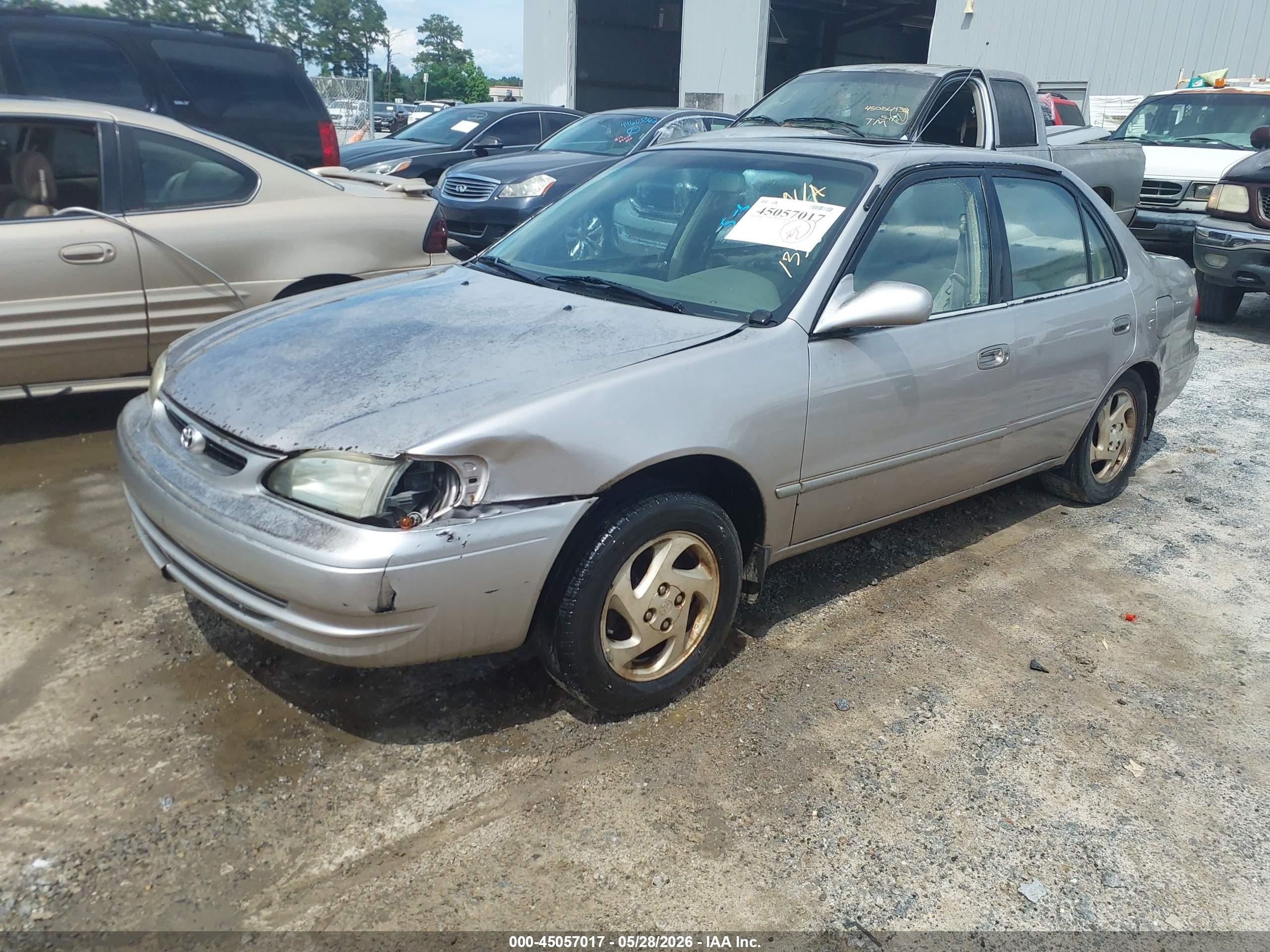 1998 Toyota Corolla Le Beige vin: 1NXBR18E2WZ135871