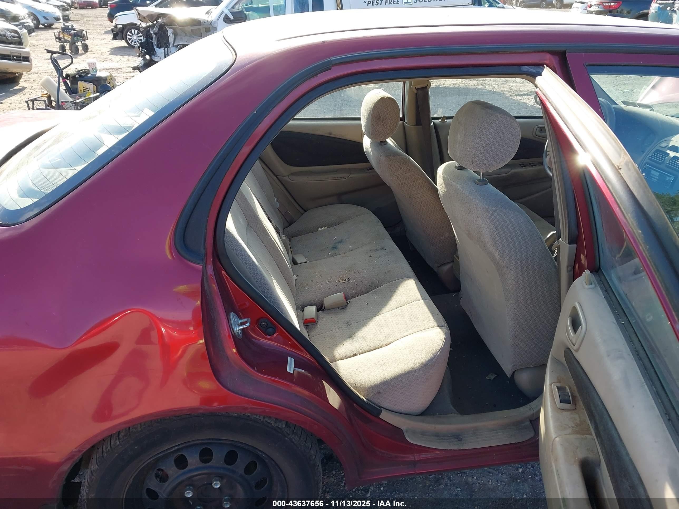 2000 Toyota Corolla Ce Burgundy vin: 1NXBR18E5YZ304607
