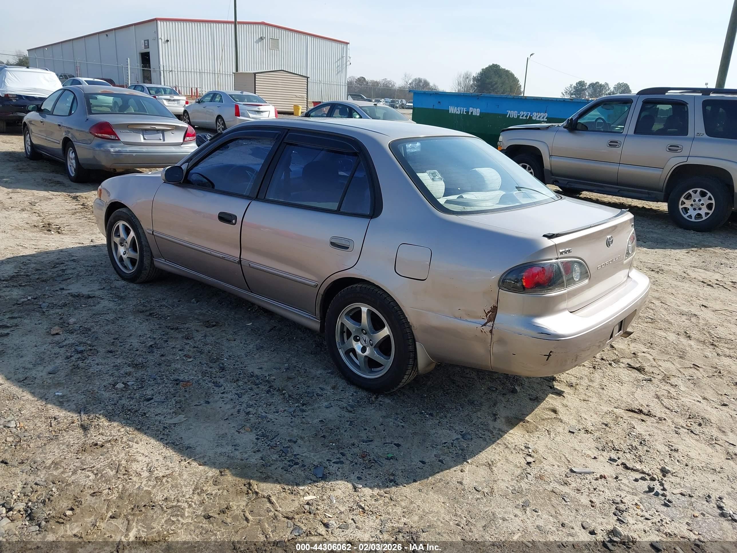 1998 Toyota Corolla Le Tan vin: 1NXBR18EXWZ042192