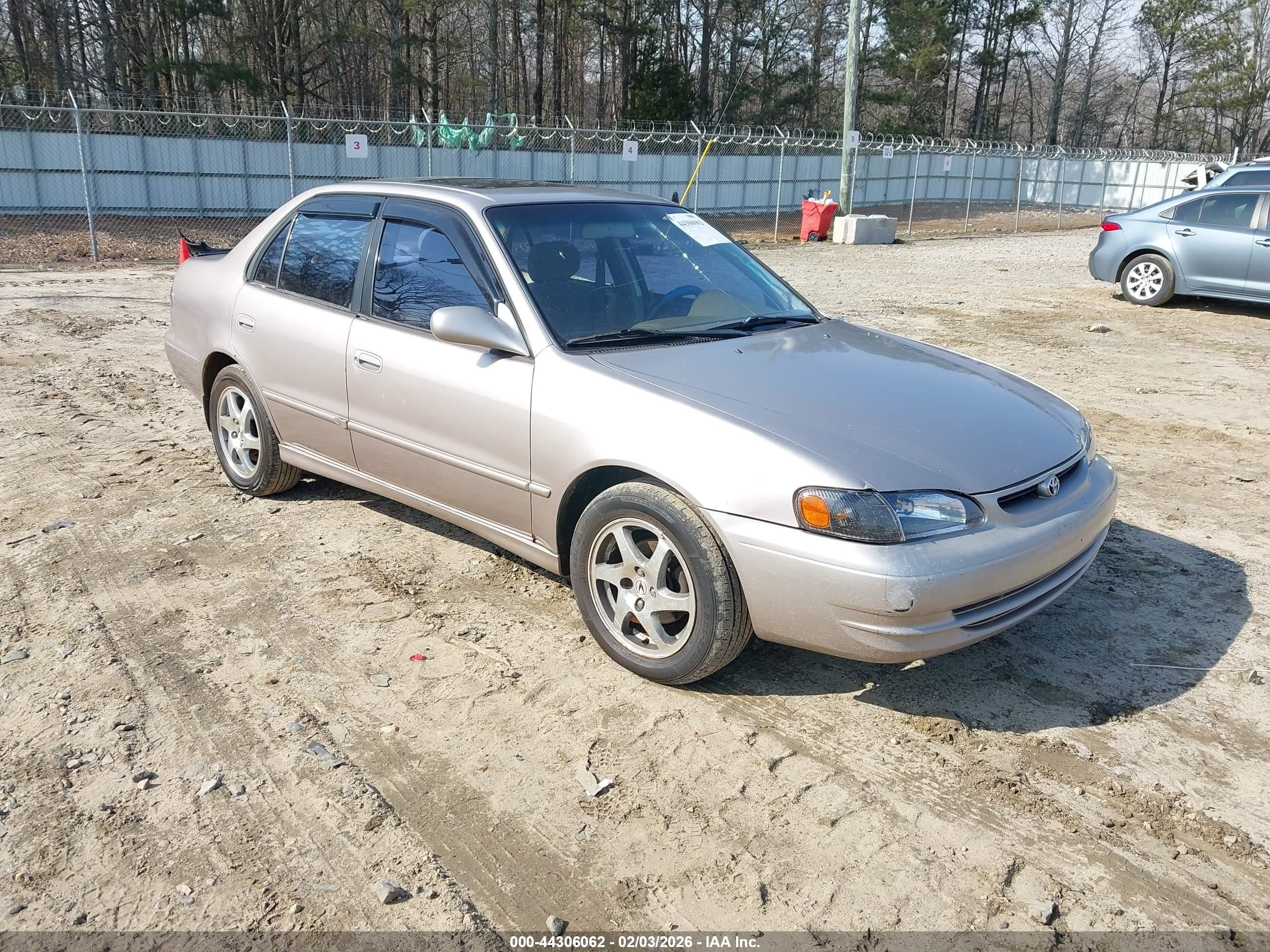 1998 Toyota Corolla Le Tan vin: 1NXBR18EXWZ042192