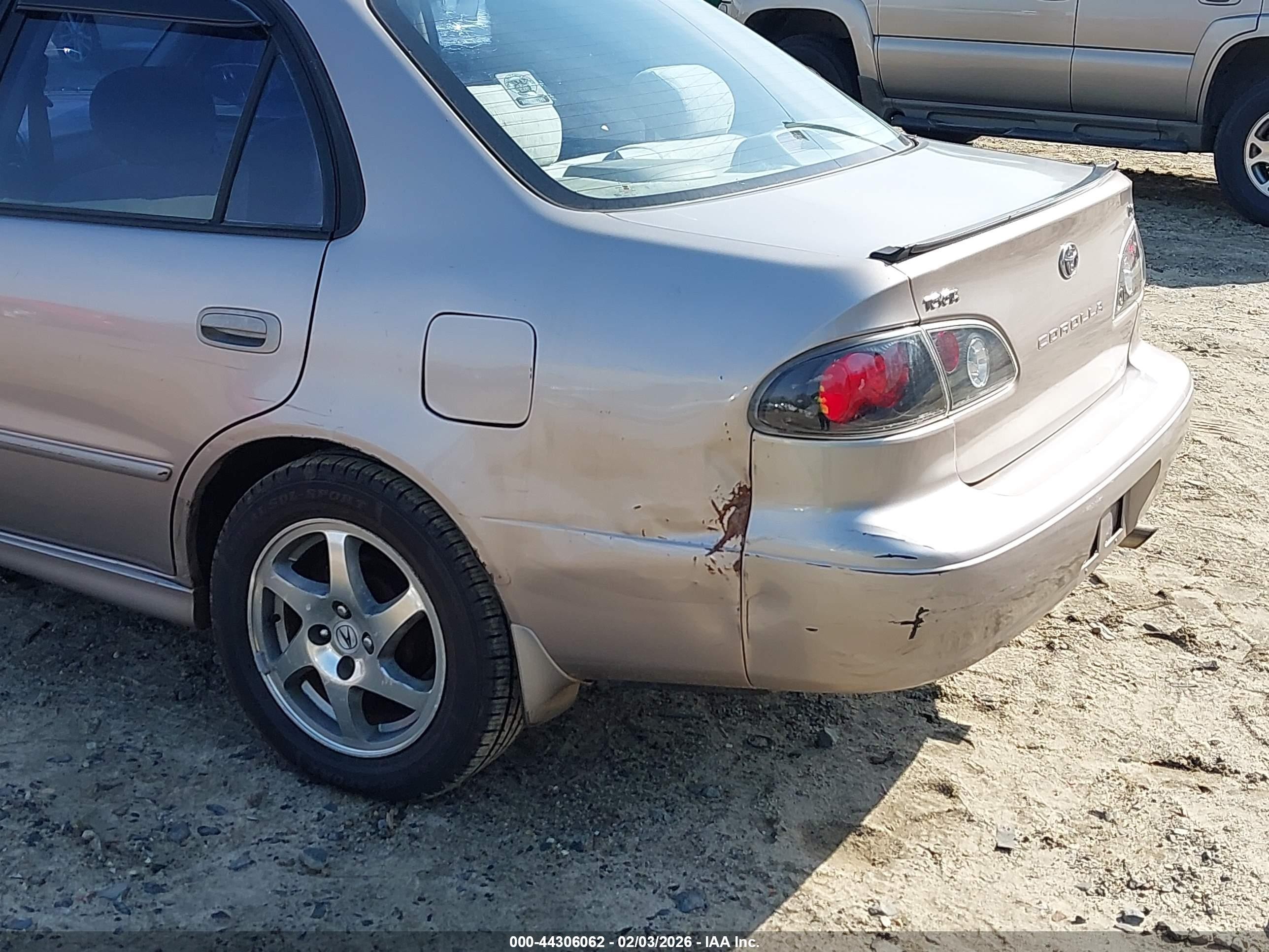 1998 Toyota Corolla Le Tan vin: 1NXBR18EXWZ042192