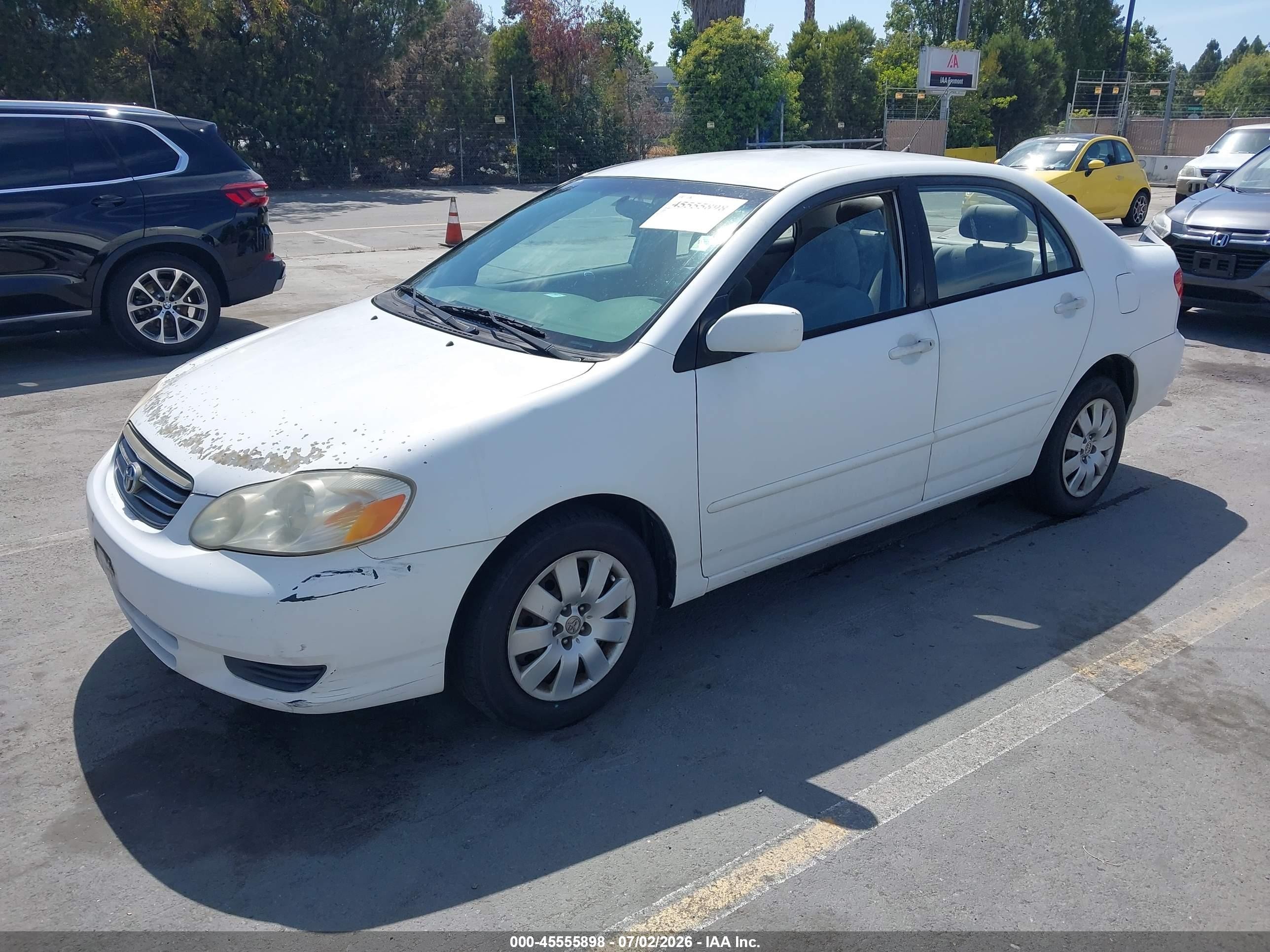 2004 Toyota Corolla Le White vin: 1NXBR32E34Z299910