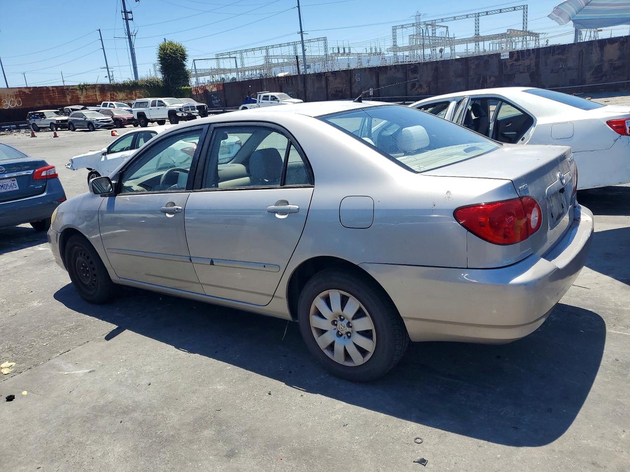 2003 Toyota Corolla Le Beige vin: 1NXBR32E53Z032170