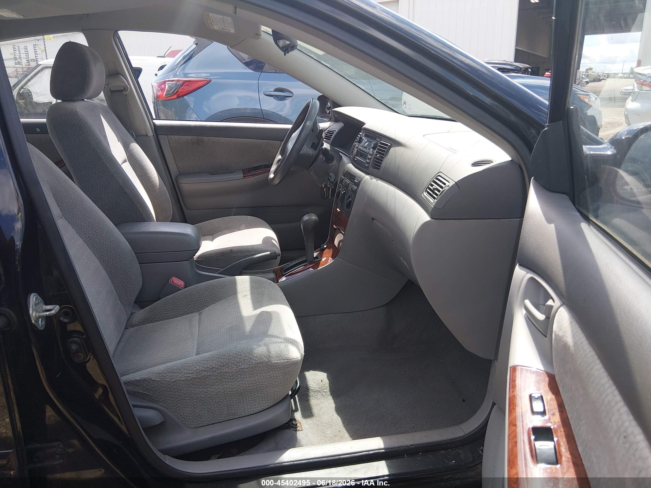 2004 Toyota Corolla Le Black vin: 1NXBR32EX4Z213704
