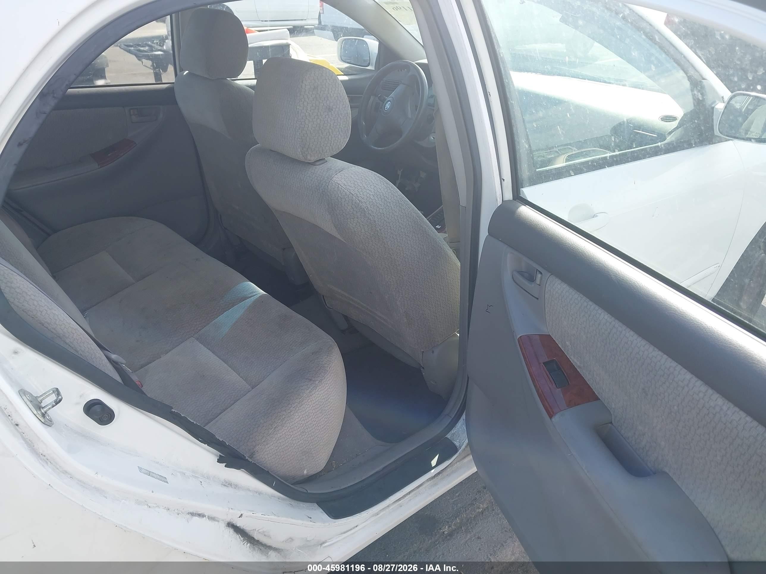 2004 Toyota Corolla Le White vin: 1NXBR32EX4Z304178