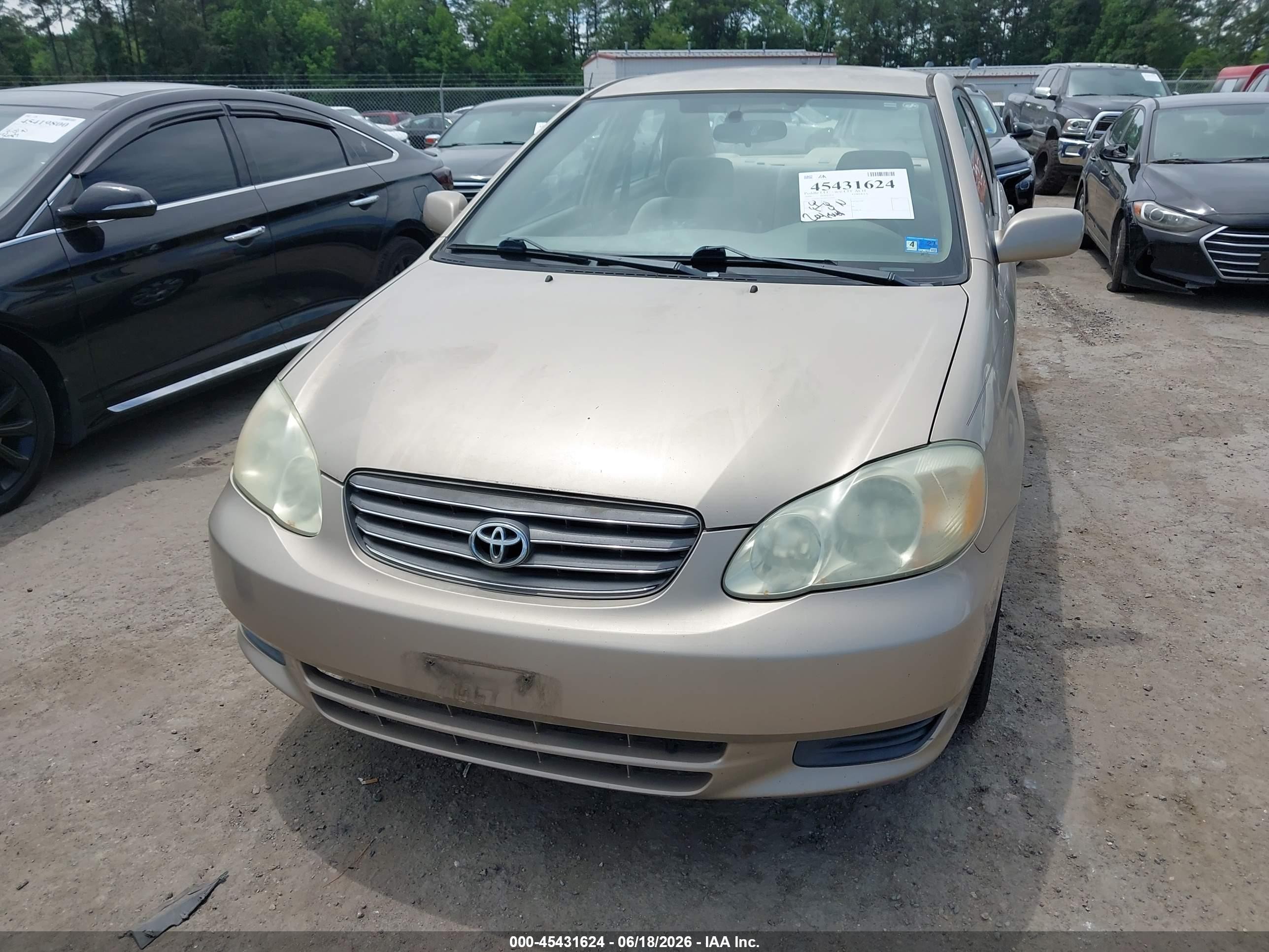 2004 Toyota Corolla Le Gold vin: 1NXBR32EX4Z315696