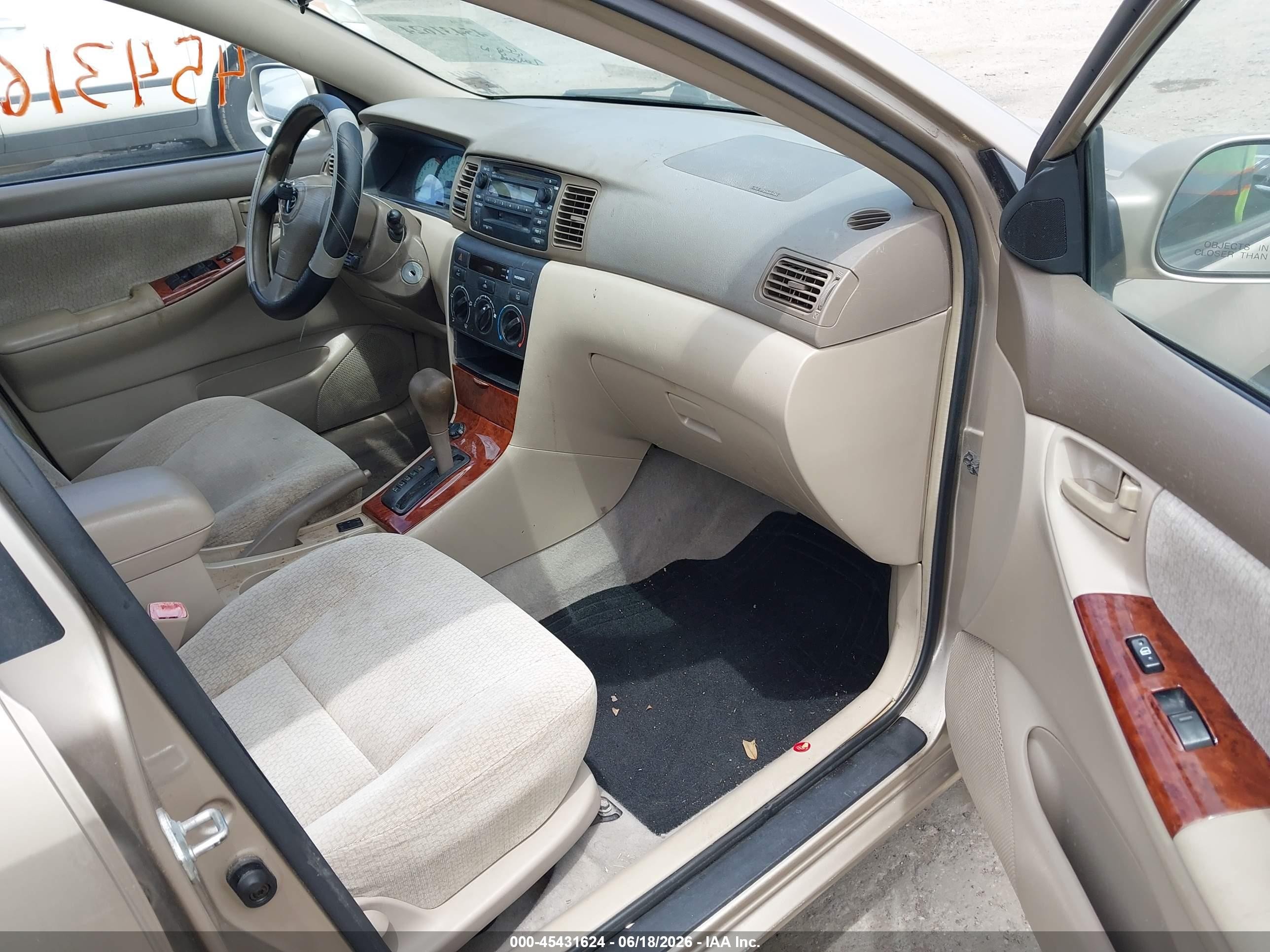 2004 Toyota Corolla Le Gold vin: 1NXBR32EX4Z315696