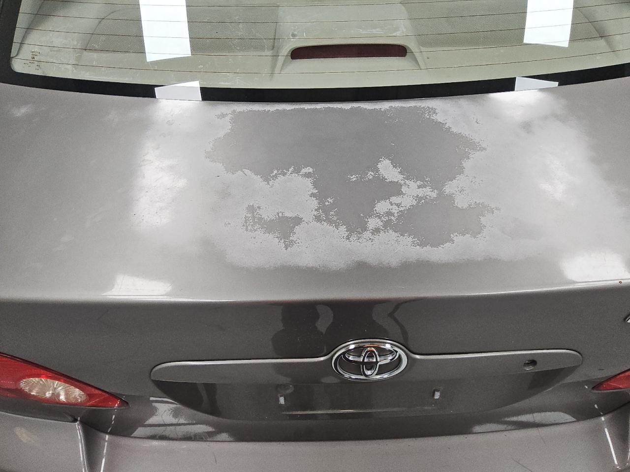2004 Toyota Corolla Le Gray vin: 1NXBR32EX4Z336600 Damage: Deck Lid, Peeling, > 12 Inches