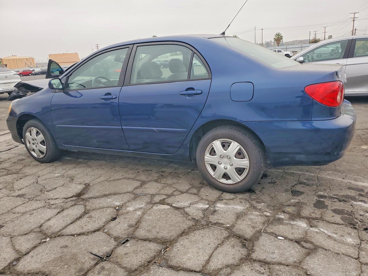 2005 Toyota Corolla Le Blue vin: 1NXBR32EX5Z473098